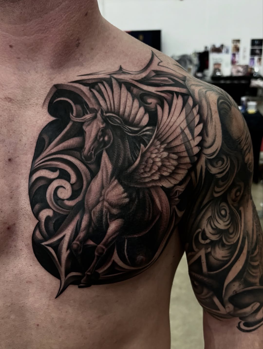 Tattoo by @taboo.tattoos_ — realism, black_and_grey