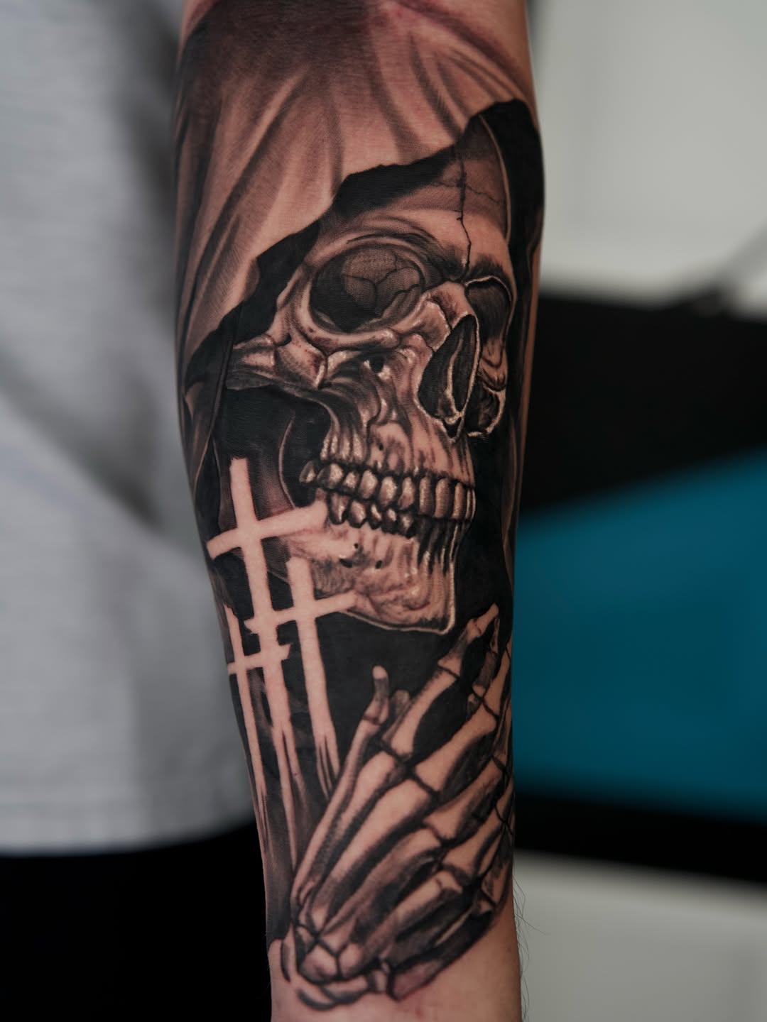 Realism tattoo on the forearm by Travis