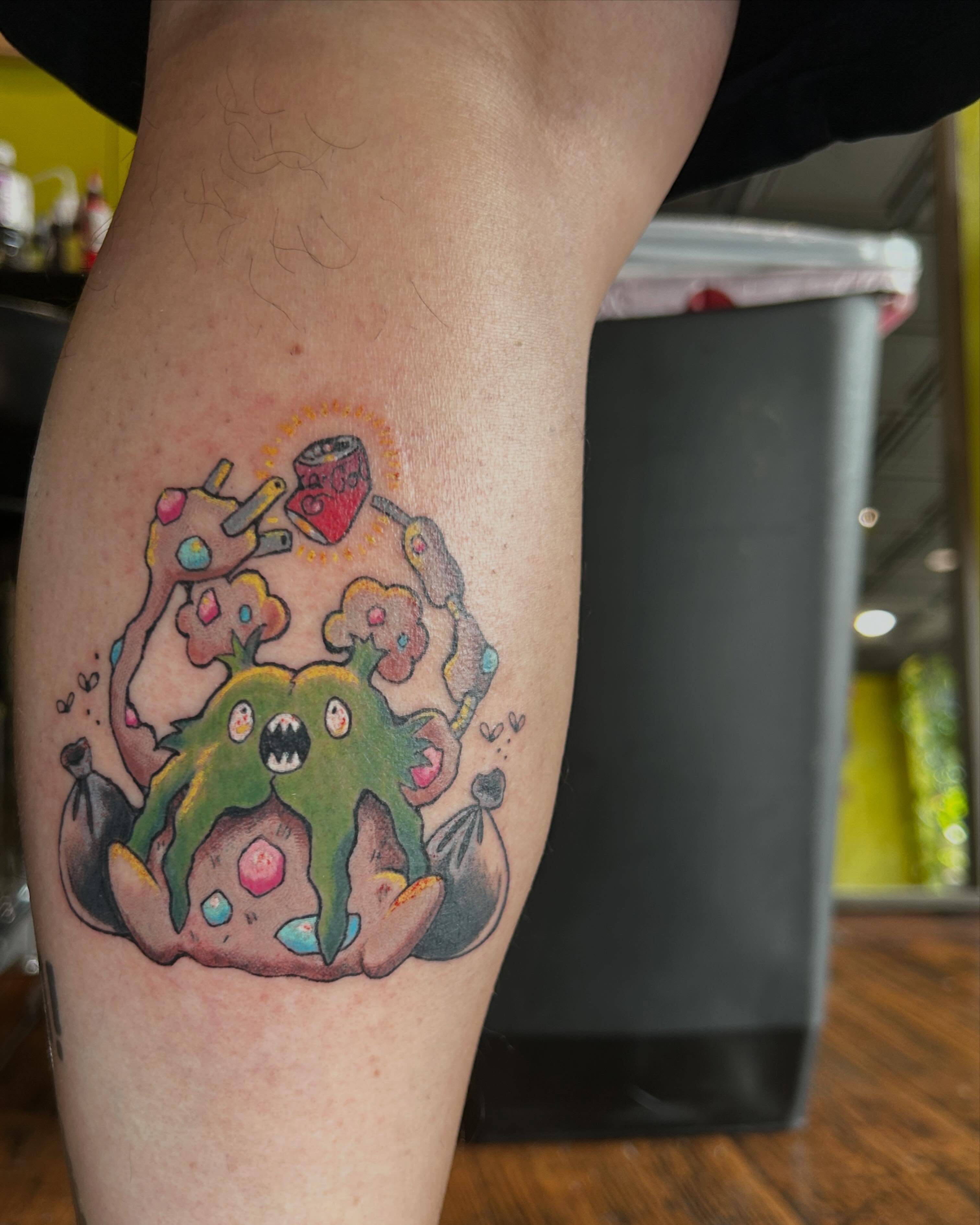 Octopus with weapons new school tattoo on the thigh by Alex