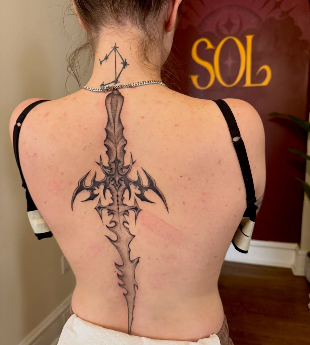 Sword black and grey tattoo on the back by πππππ¨π¨ ππ«ππ’π¬π