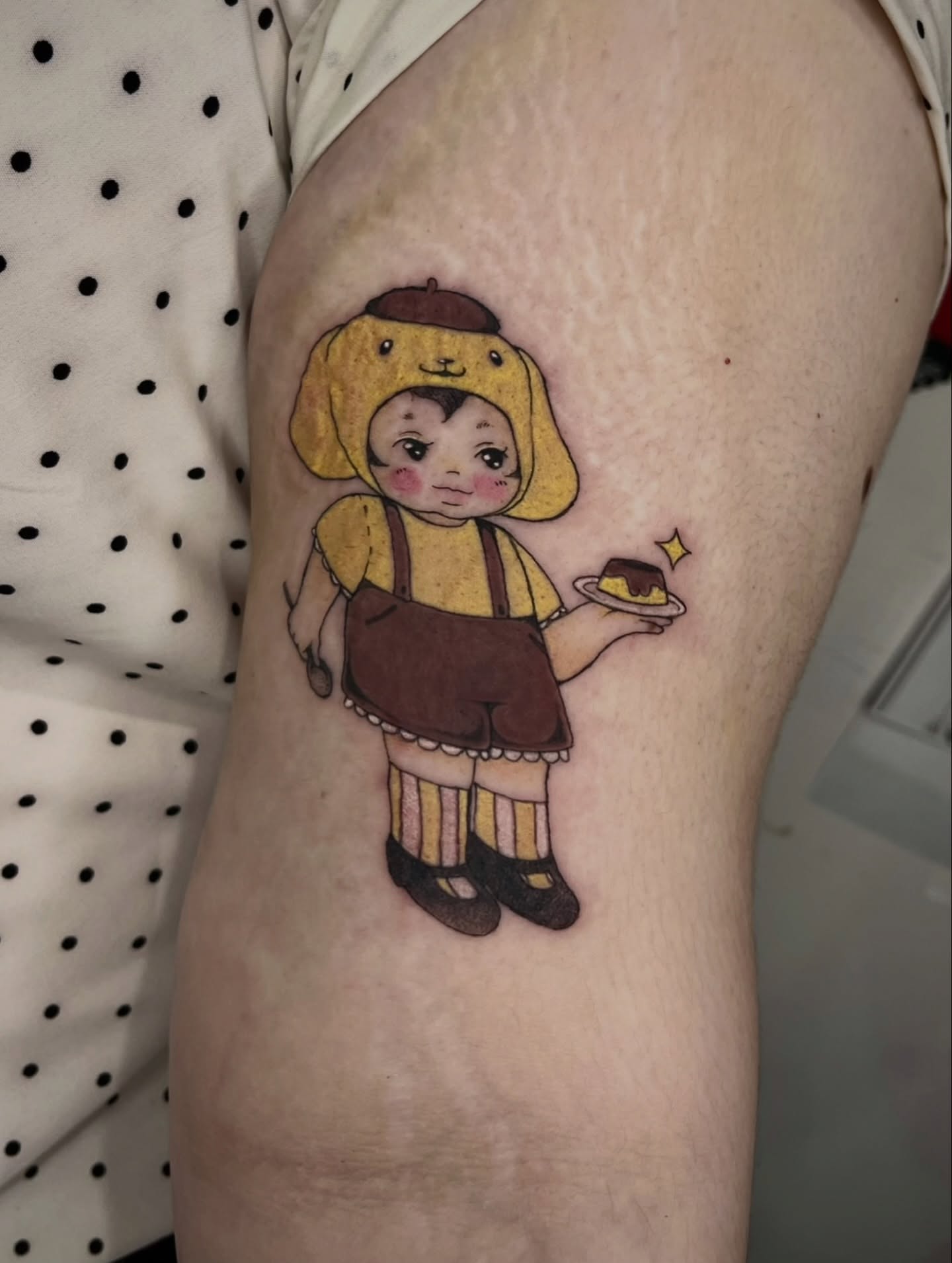 Dog character illustrative tattoo on the thigh by Sarah Jurgielewicz