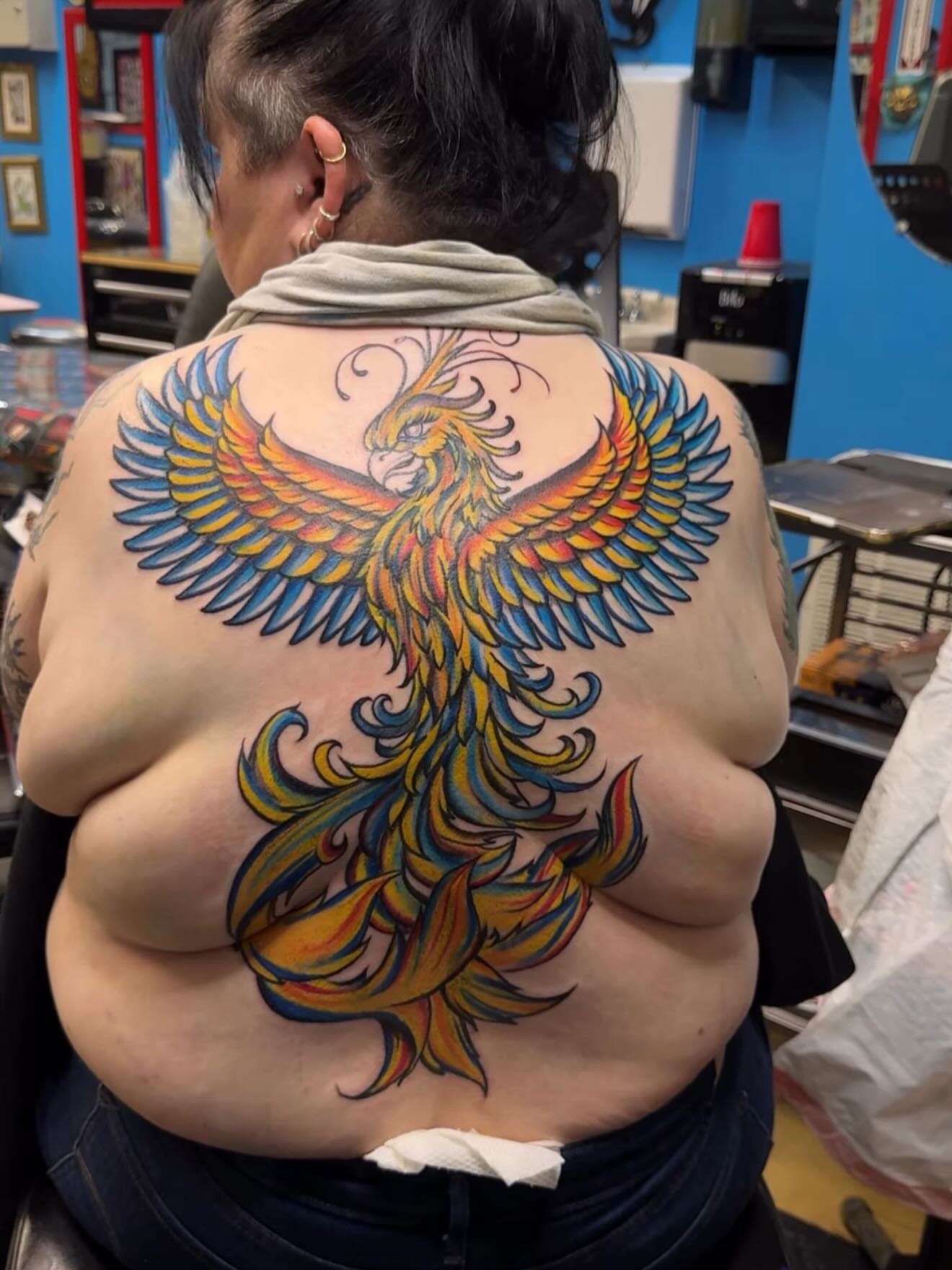 Phoenix new school tattoo on the back by Gary Chase
