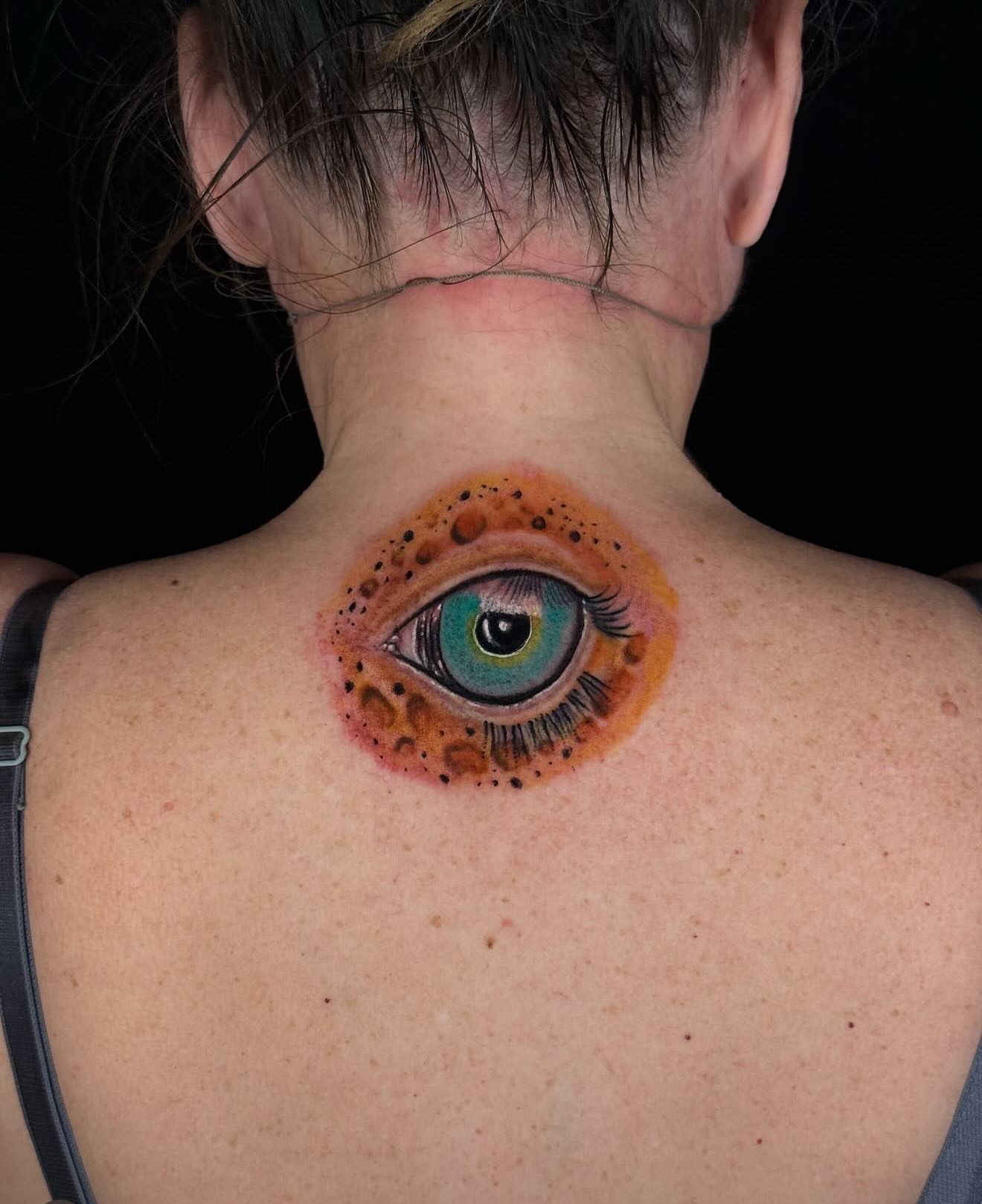 Eye realism tattoo on the back by Gary Chase