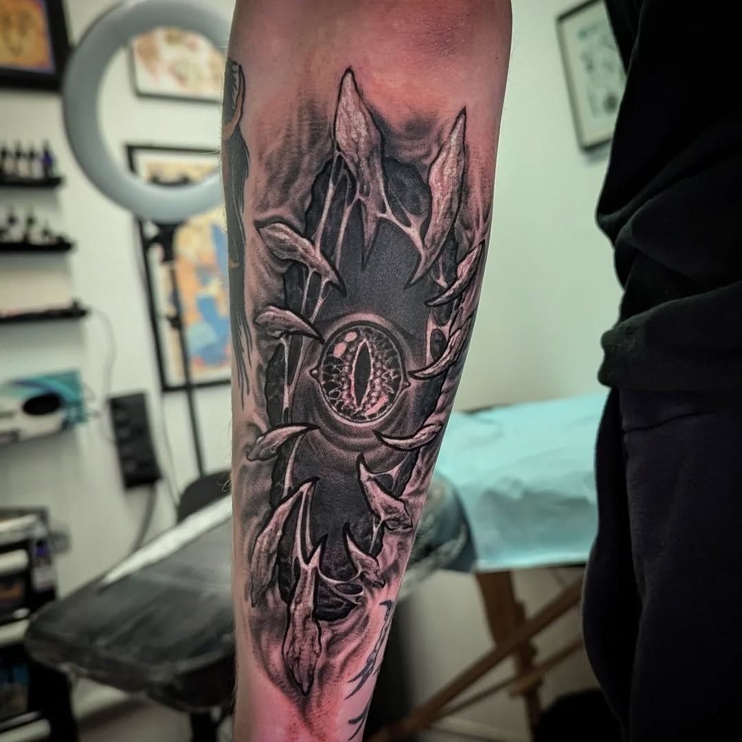 Tattoo by @loreleitattoos — dark_realism, black_and_grey