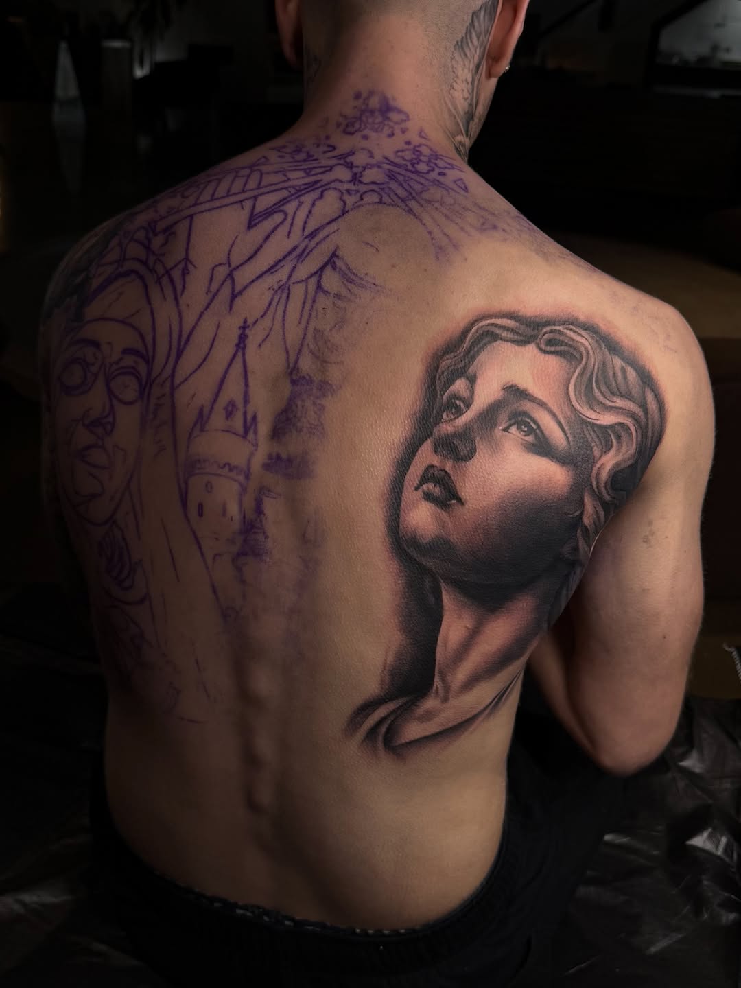 Portrait of a woman realism tattoo on the back by Grace P