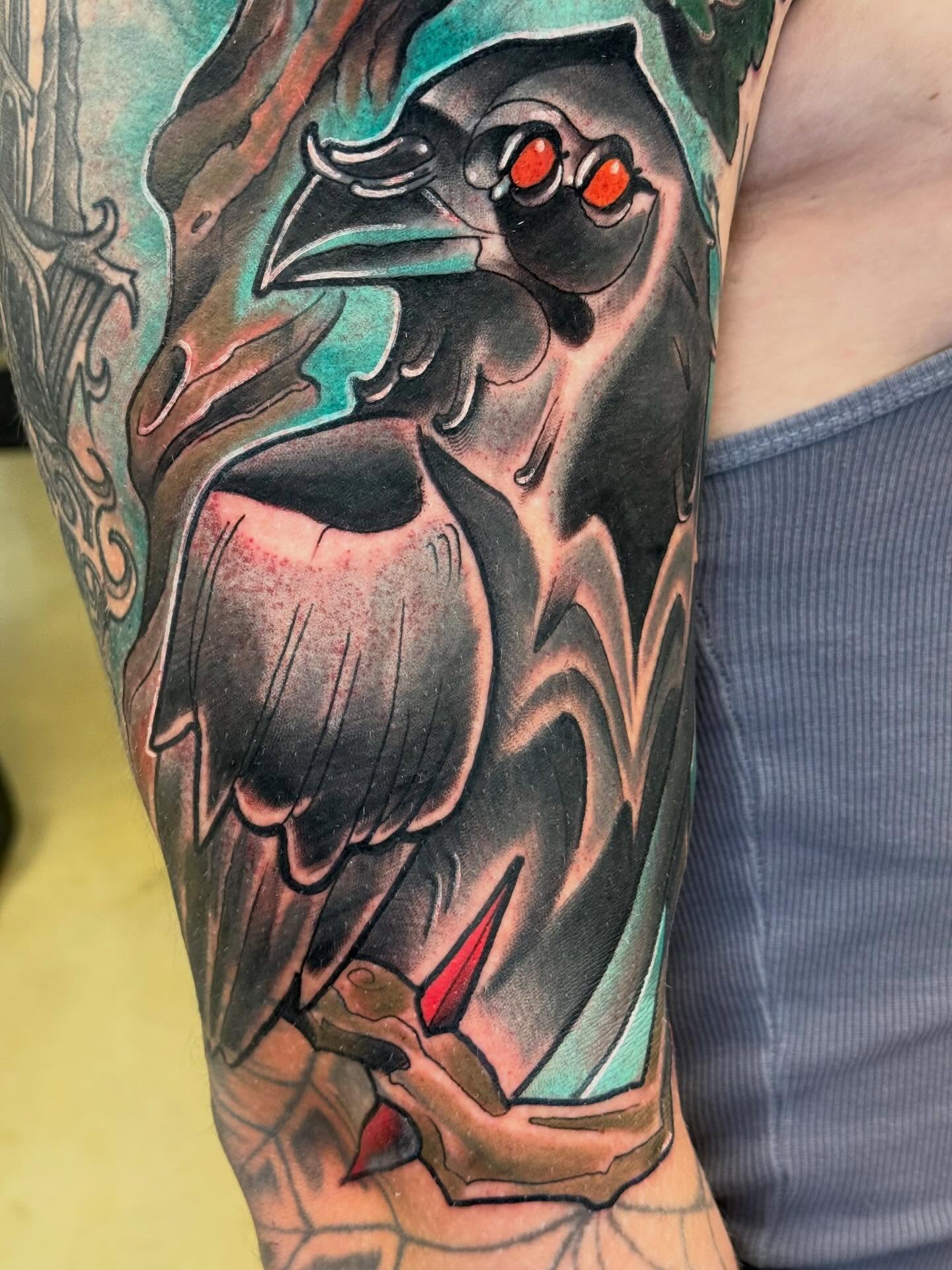 Crow American traditional tattoo on the forearm by Chris Smiseck