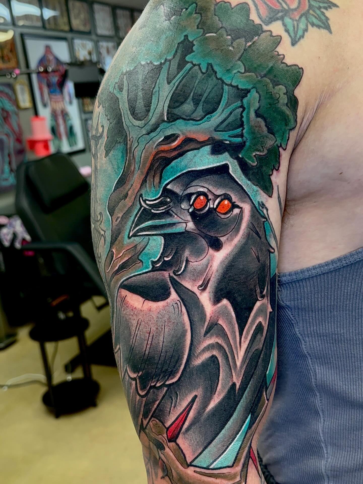 Crow American traditional tattoo on the forearm by Chris Smiseck