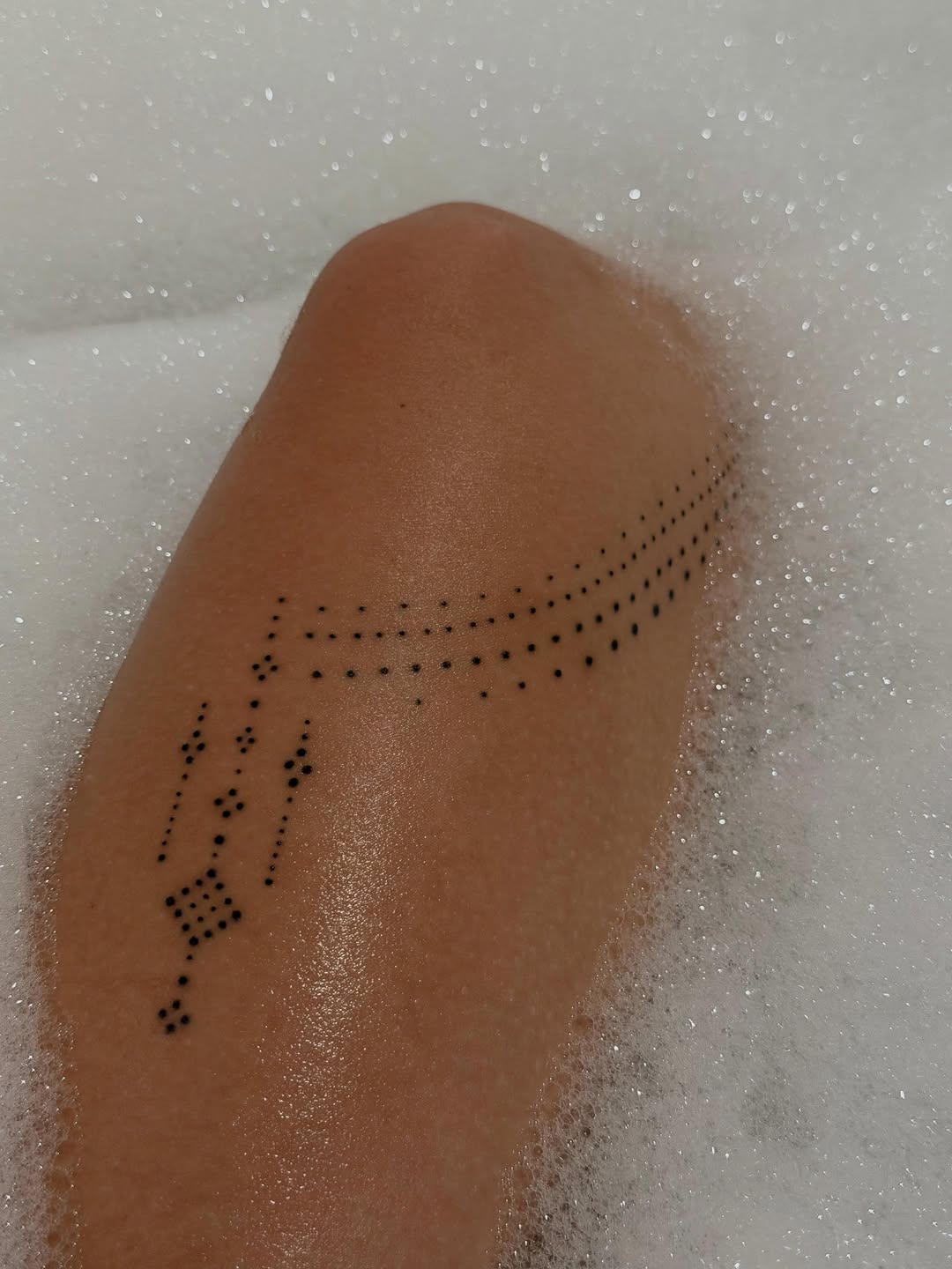Tattoo by @lanamoontatu — dotwork, geometric