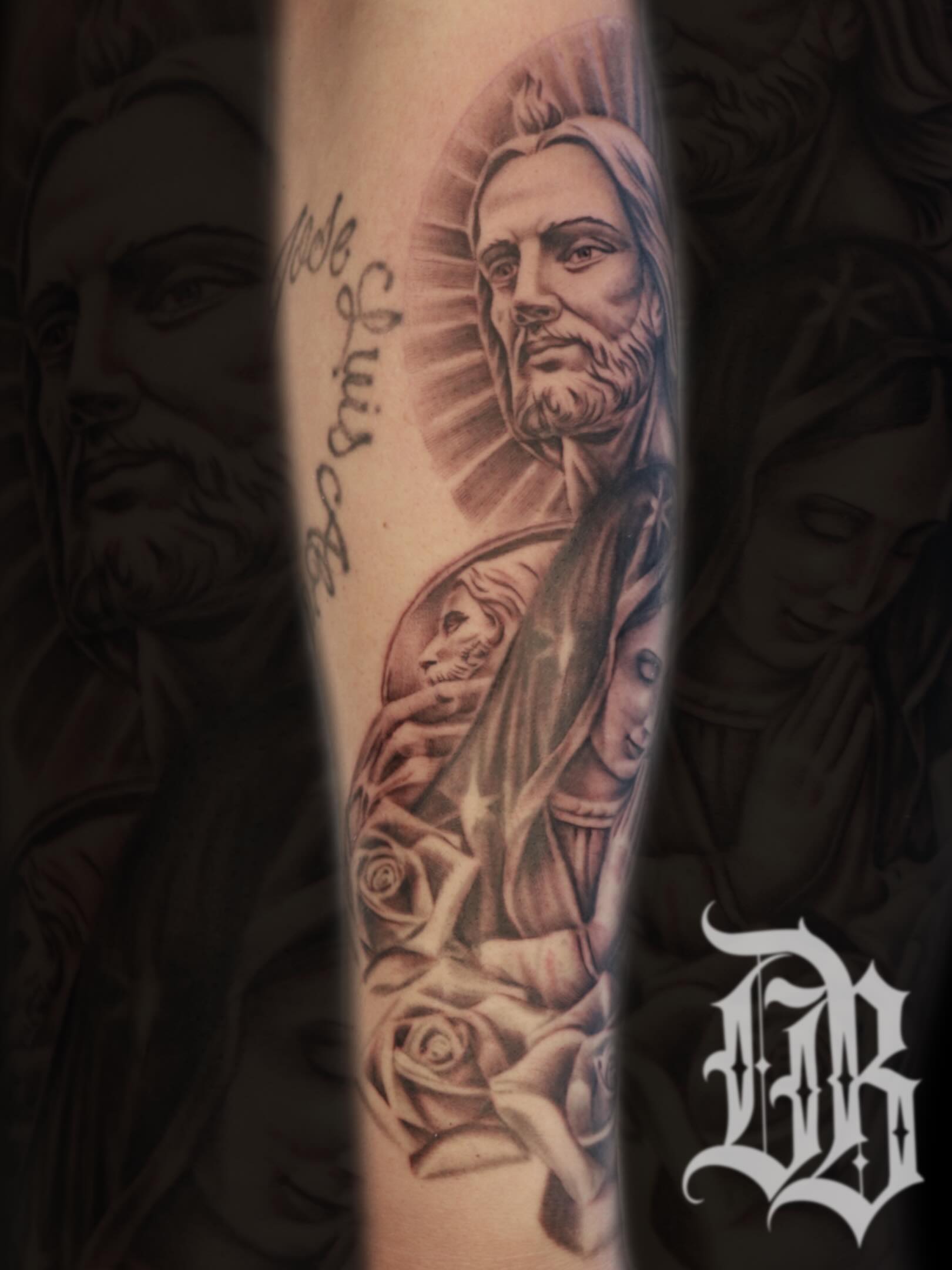 Religious figure with child realism tattoo on the forearm by Daniel Rodriguez
