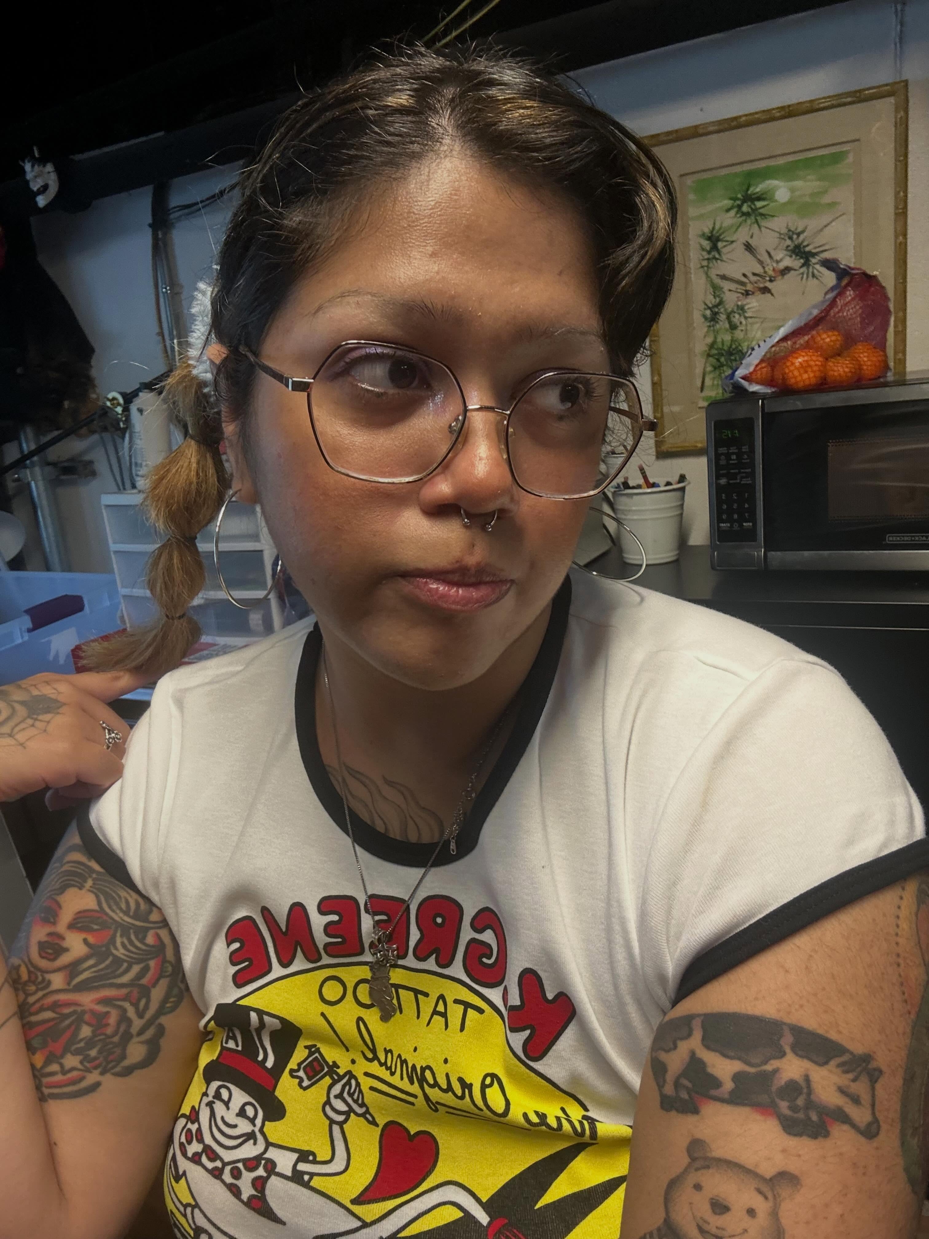 Tattooed shirt American traditional tattoo on the torso by Sanjuanita