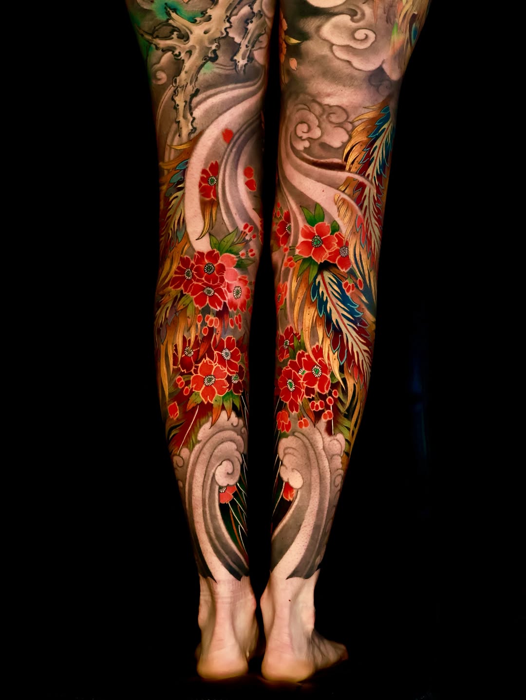 Phoenix and flowers Japanese tattoo on the leg by Hocheon