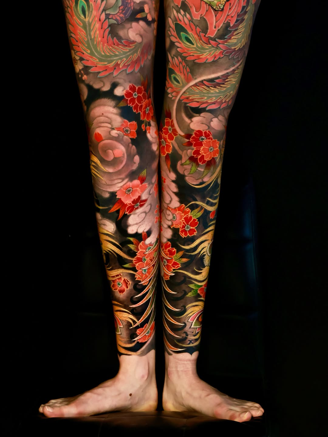 Phoenix and flowers Japanese tattoo on the leg by Hocheon