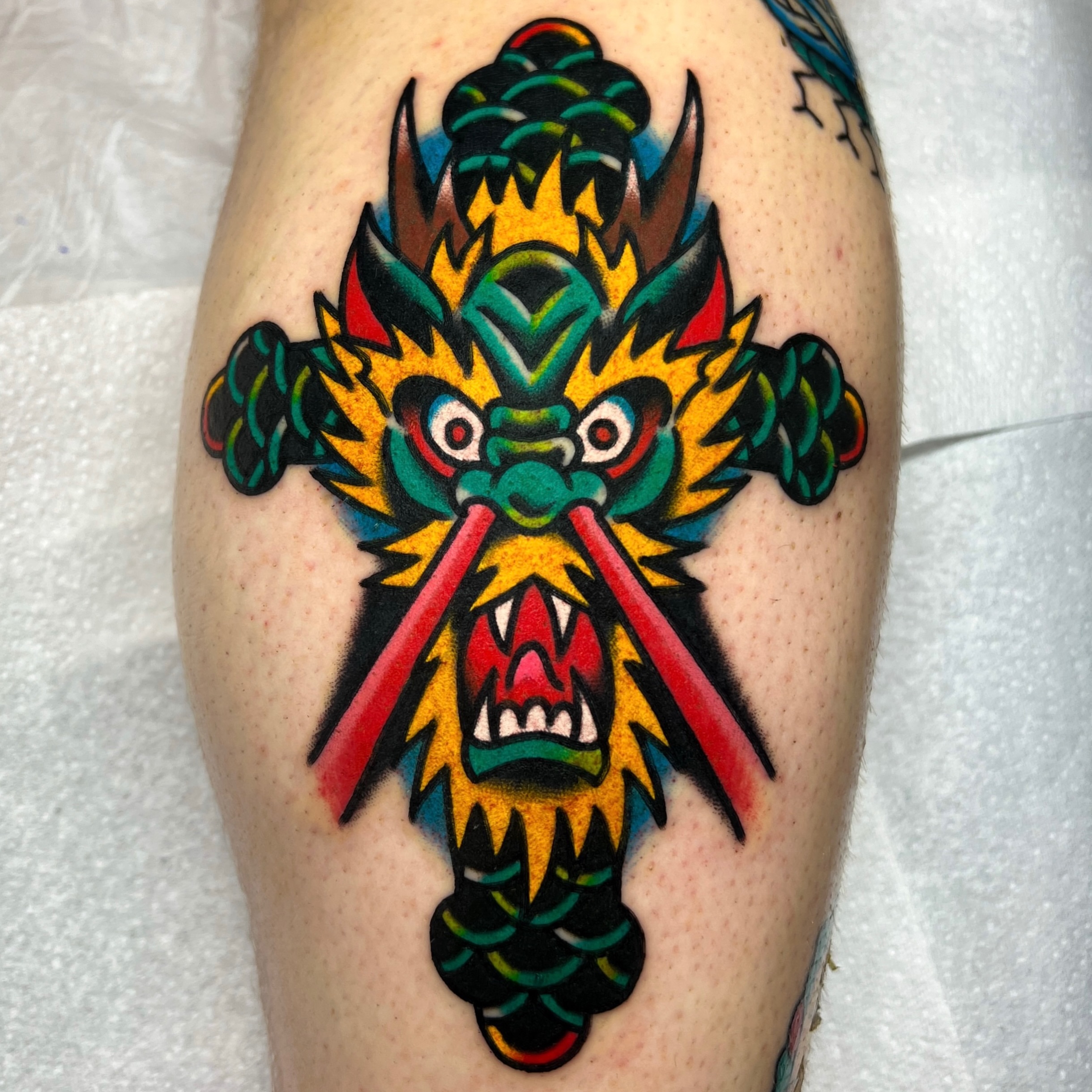 Dragon mask American traditional tattoo on the forearm by 올드스쿨타투 호무