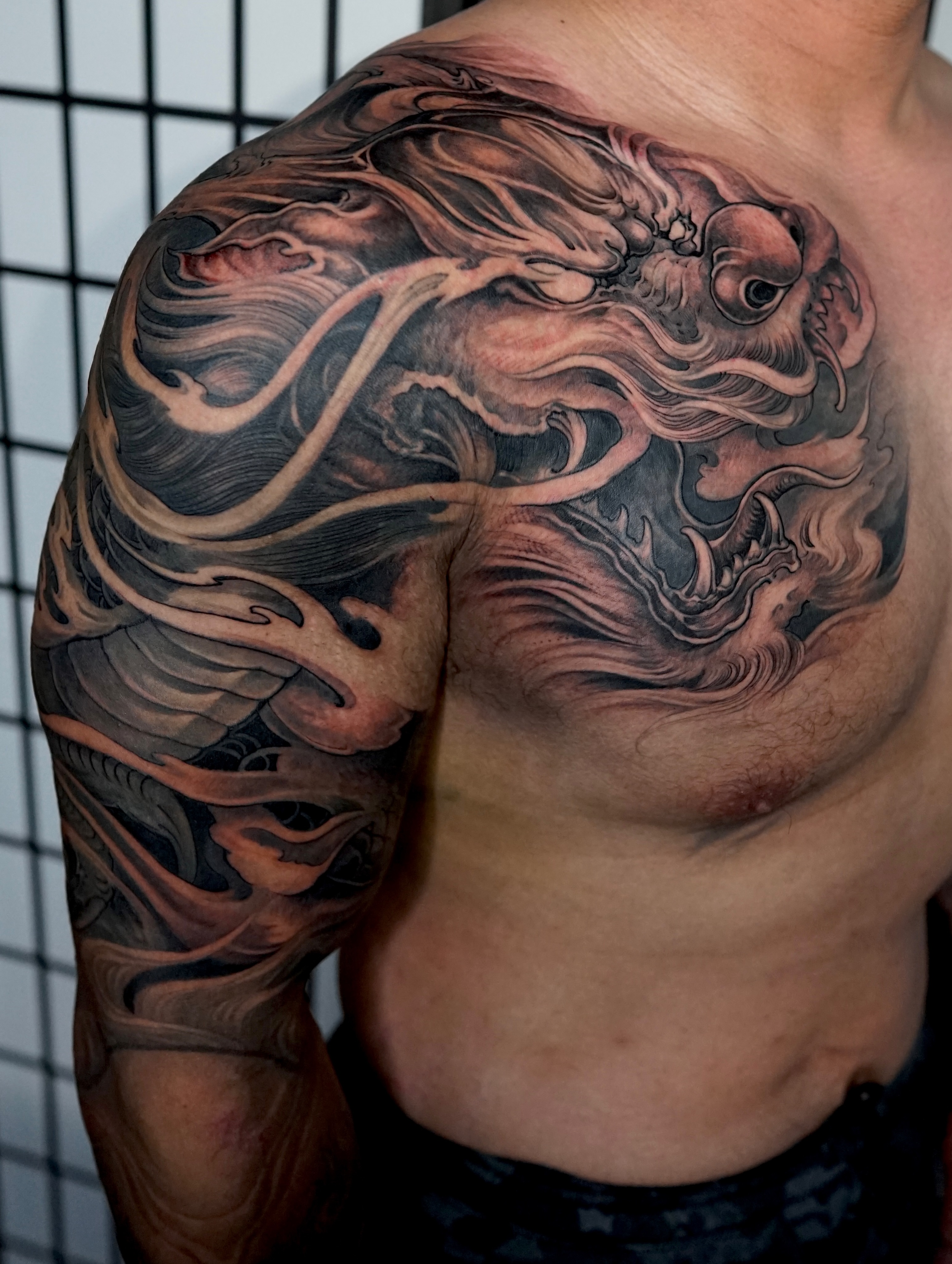 Dragon japanese irezumi tattoo on the shoulder by Thien Phan