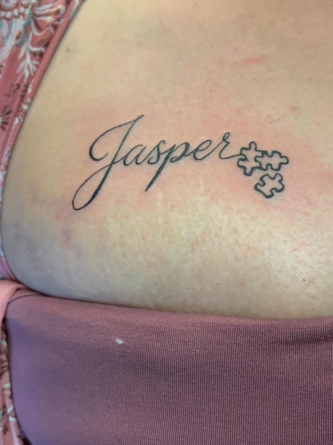 Name and puzzle pieces lettering tattoo by TP