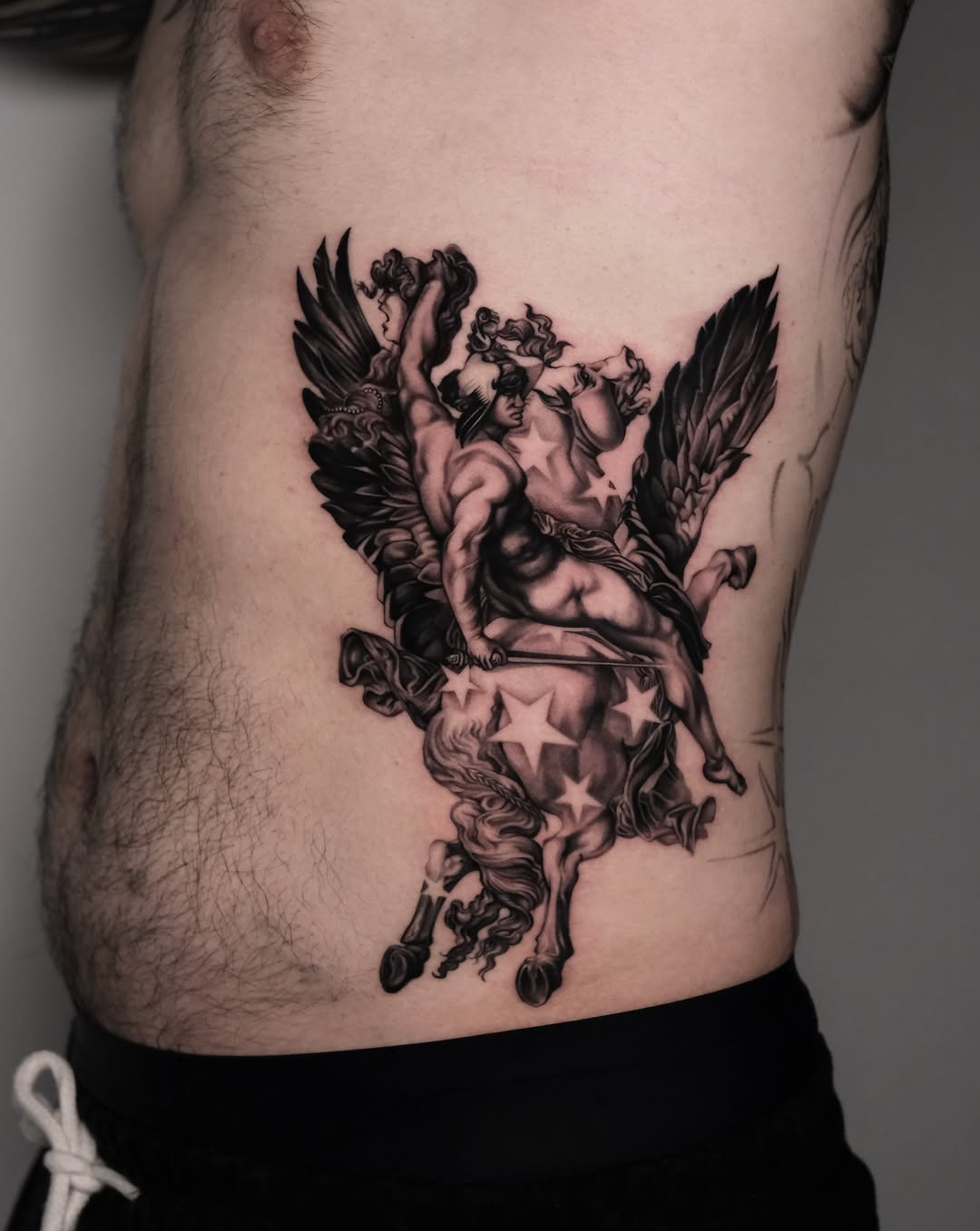 Tattoo by @a_youngg_____ β realism, black_and_grey
