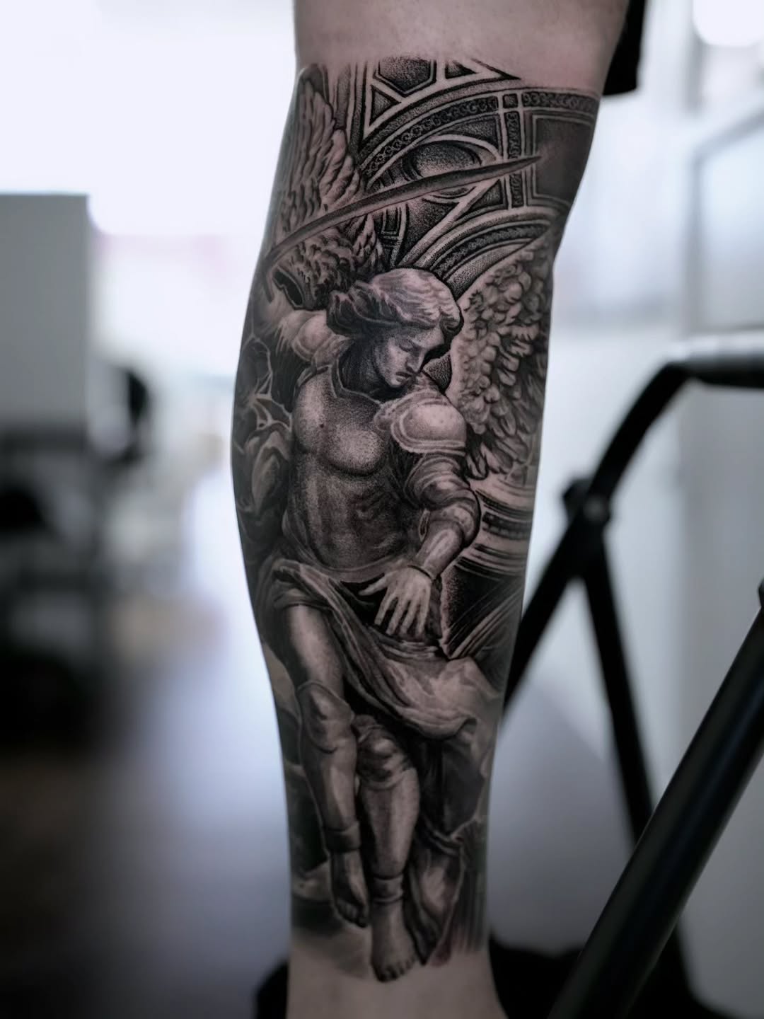 Tattoo by @vik_tattoos — realism, black_and_grey