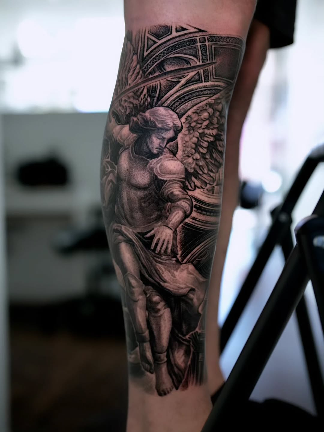 Tattoo by @vik_tattoos — realism, black_and_grey