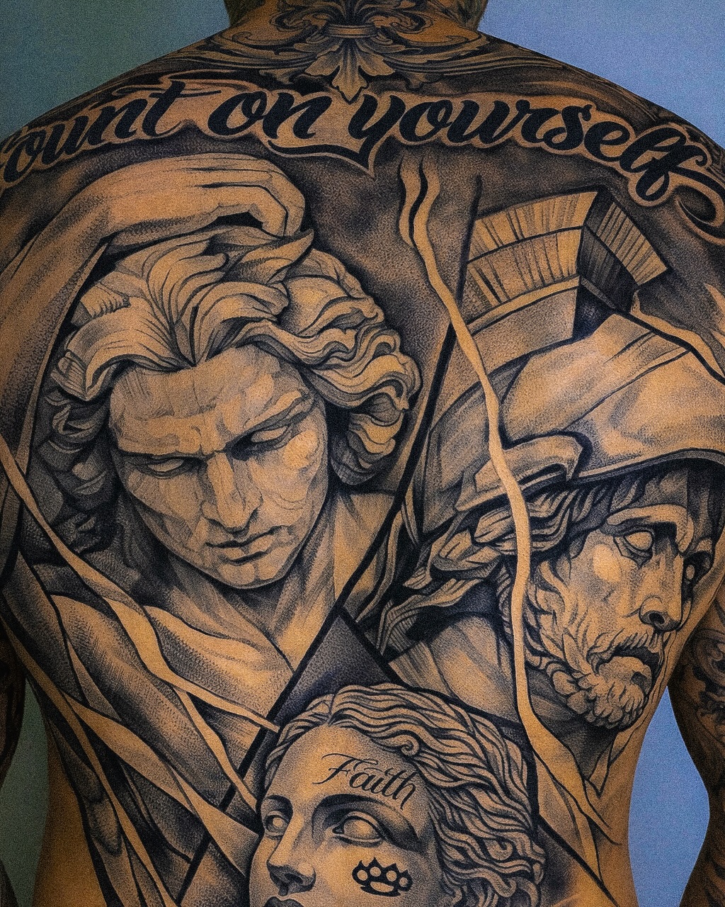 Classical sculptures and lettering realism tattoo on the back by Mak$ Brand