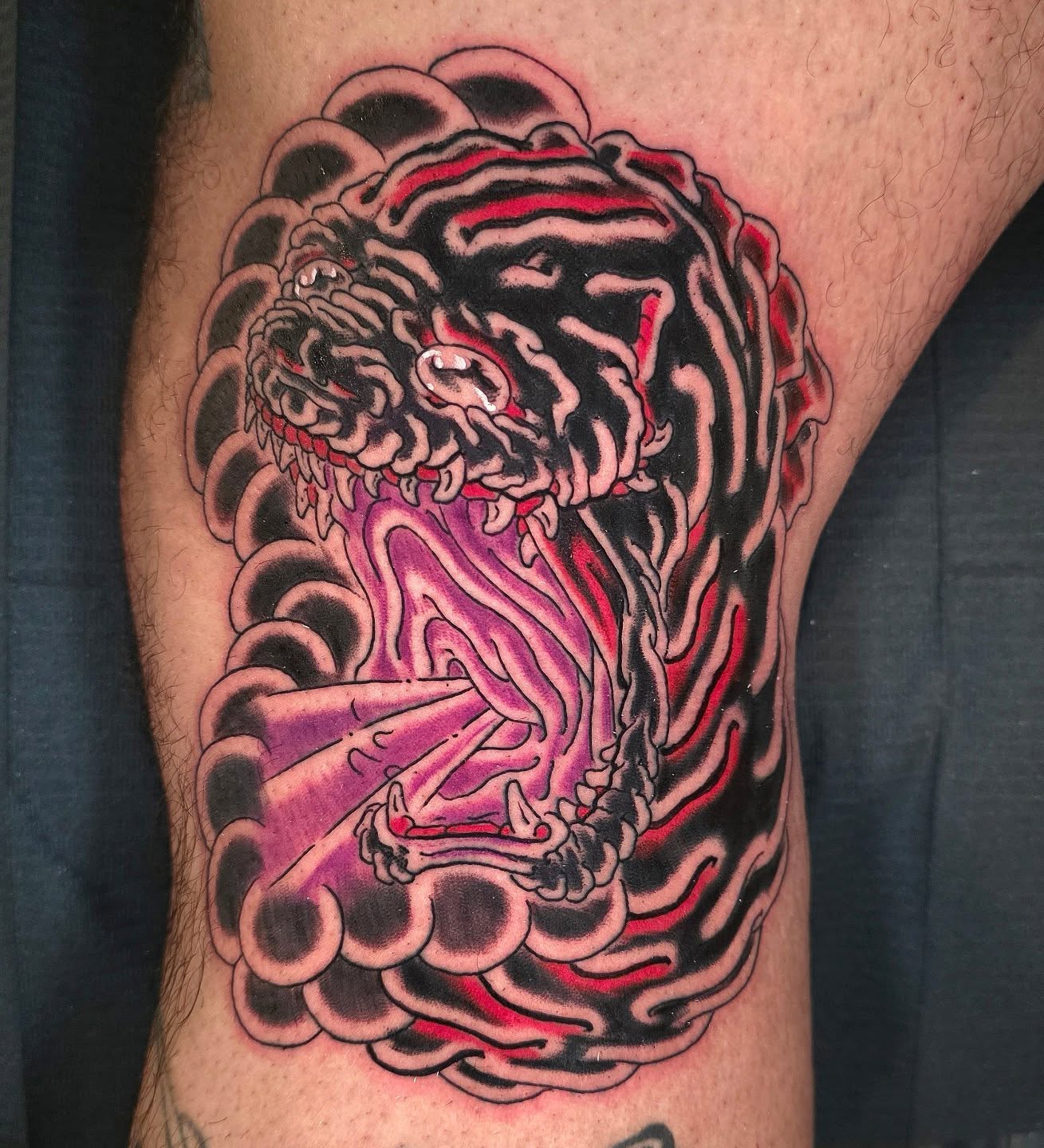 Lion japanese irezumi tattoo on the thigh by Frank Simanton