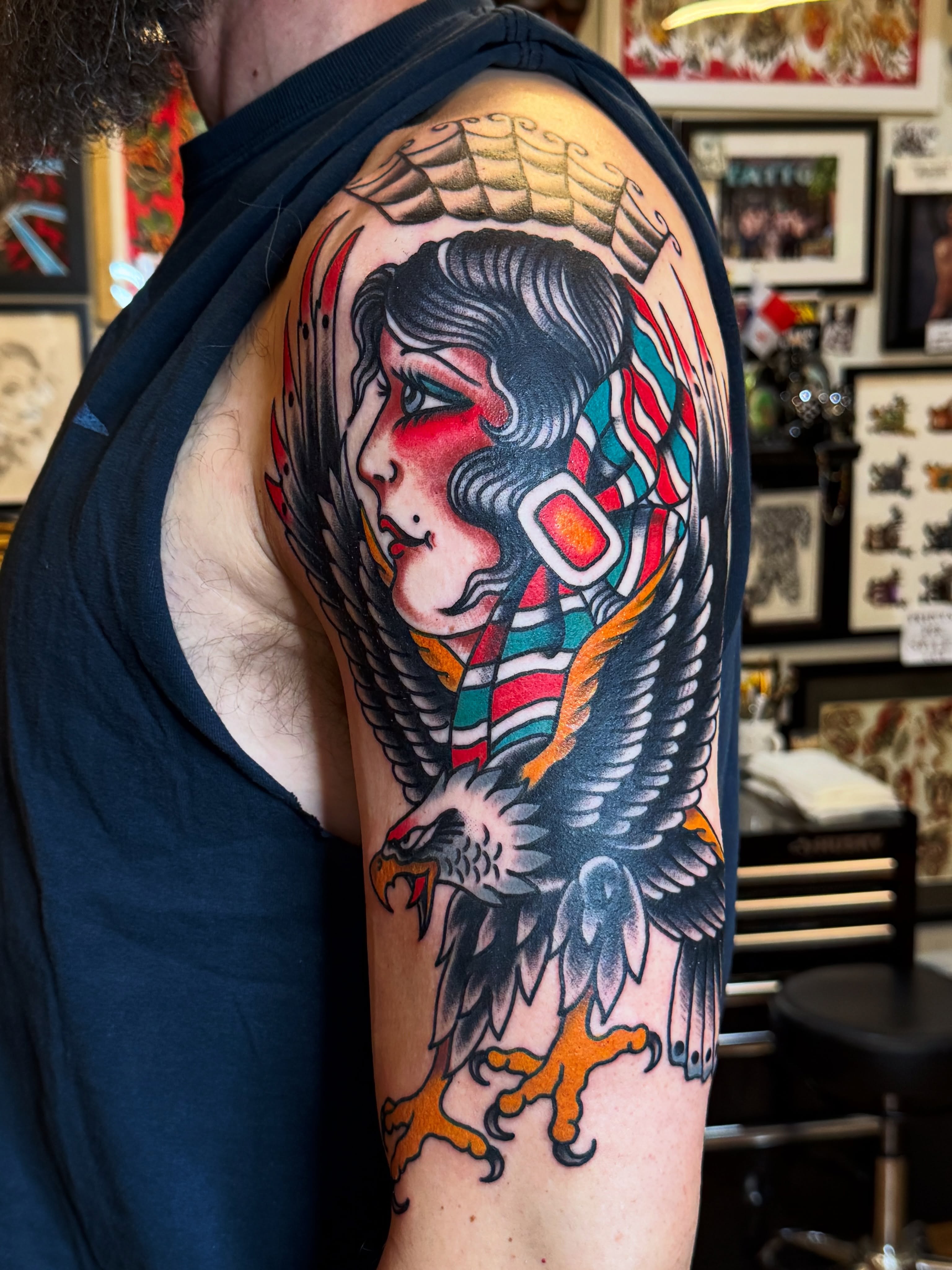 Woman with eagle American traditional tattoo on the upper arm by Dustin Paul Fowler, New York, New York