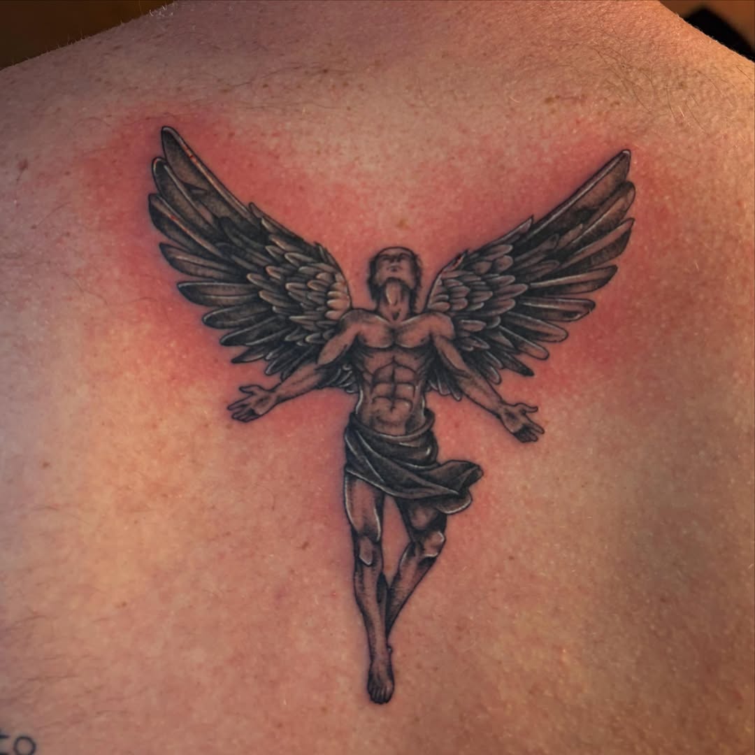 Angel black and grey tattoo on the back by destany aguilera, Davenport, Iowa