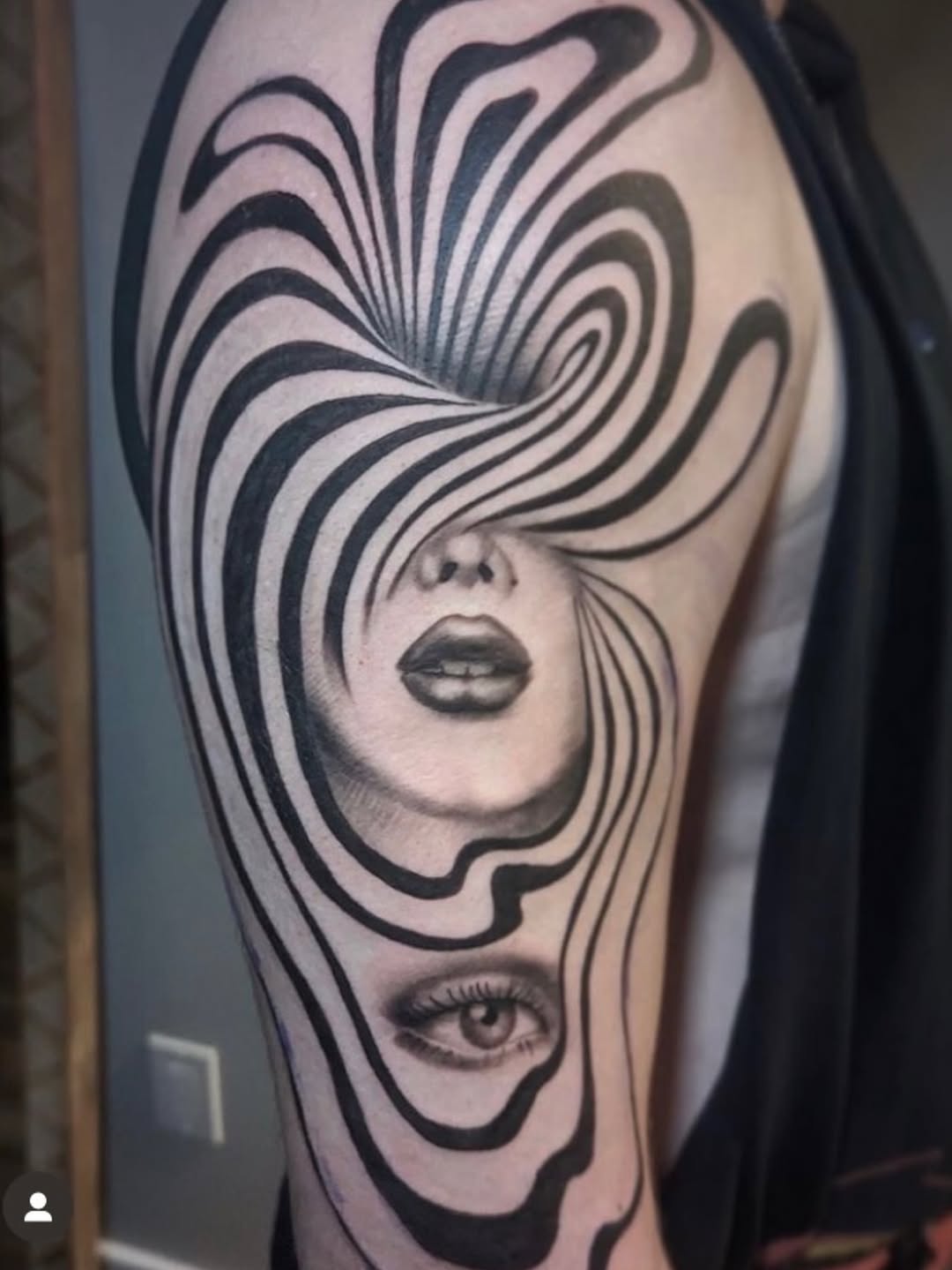 Surrealism tattoo on the shoulder by Cassandra Colleen