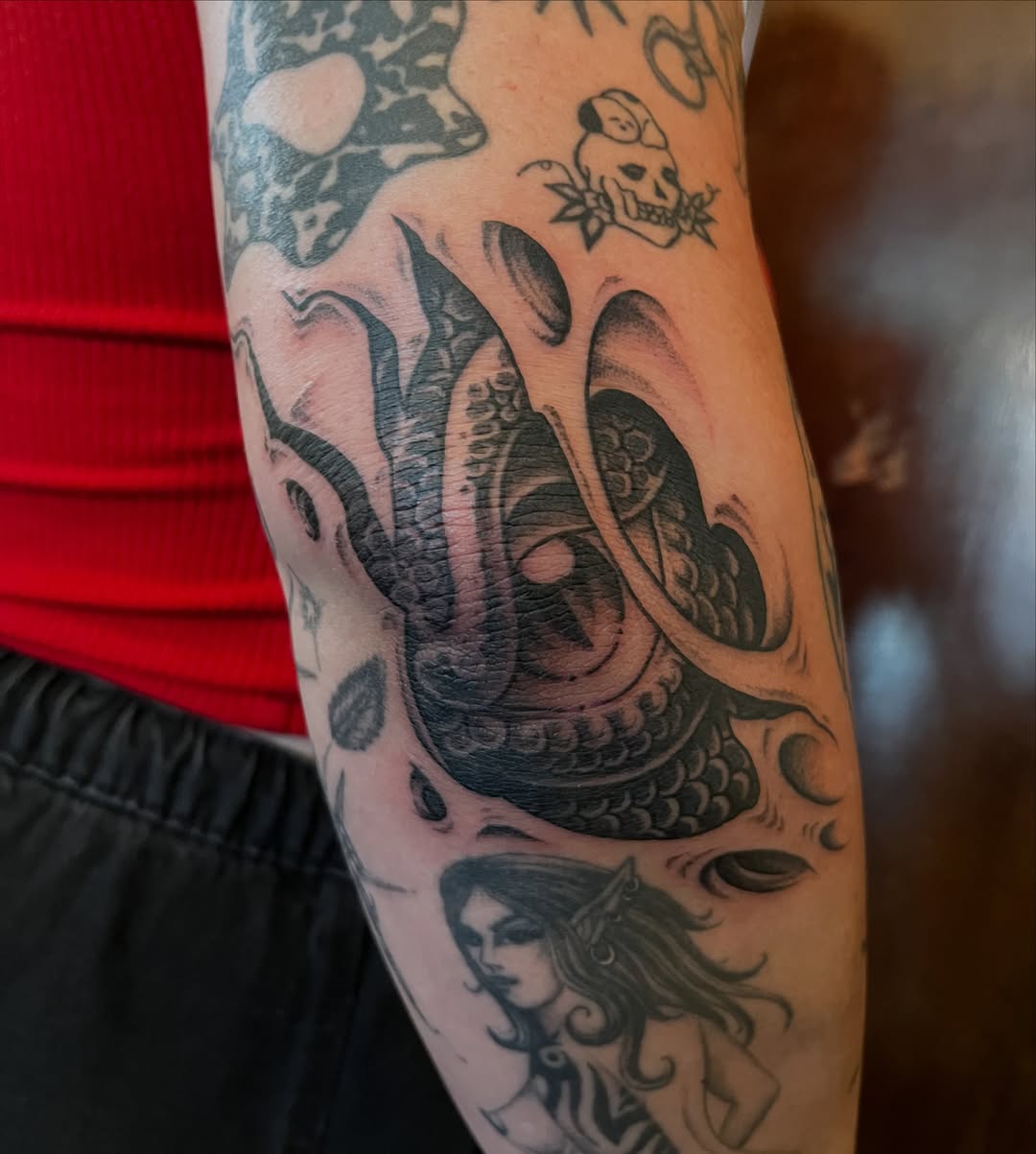 Serpent and woman realism tattoo on the forearm by Campbell Zane Alexander
