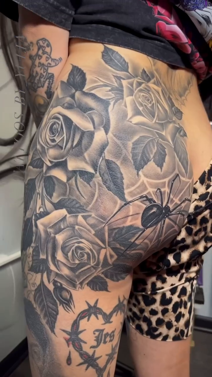 Roses and spiderweb thigh tattoo neo-traditional tattoo on the thigh by Yulia Chekir, Chicago, Illinois
