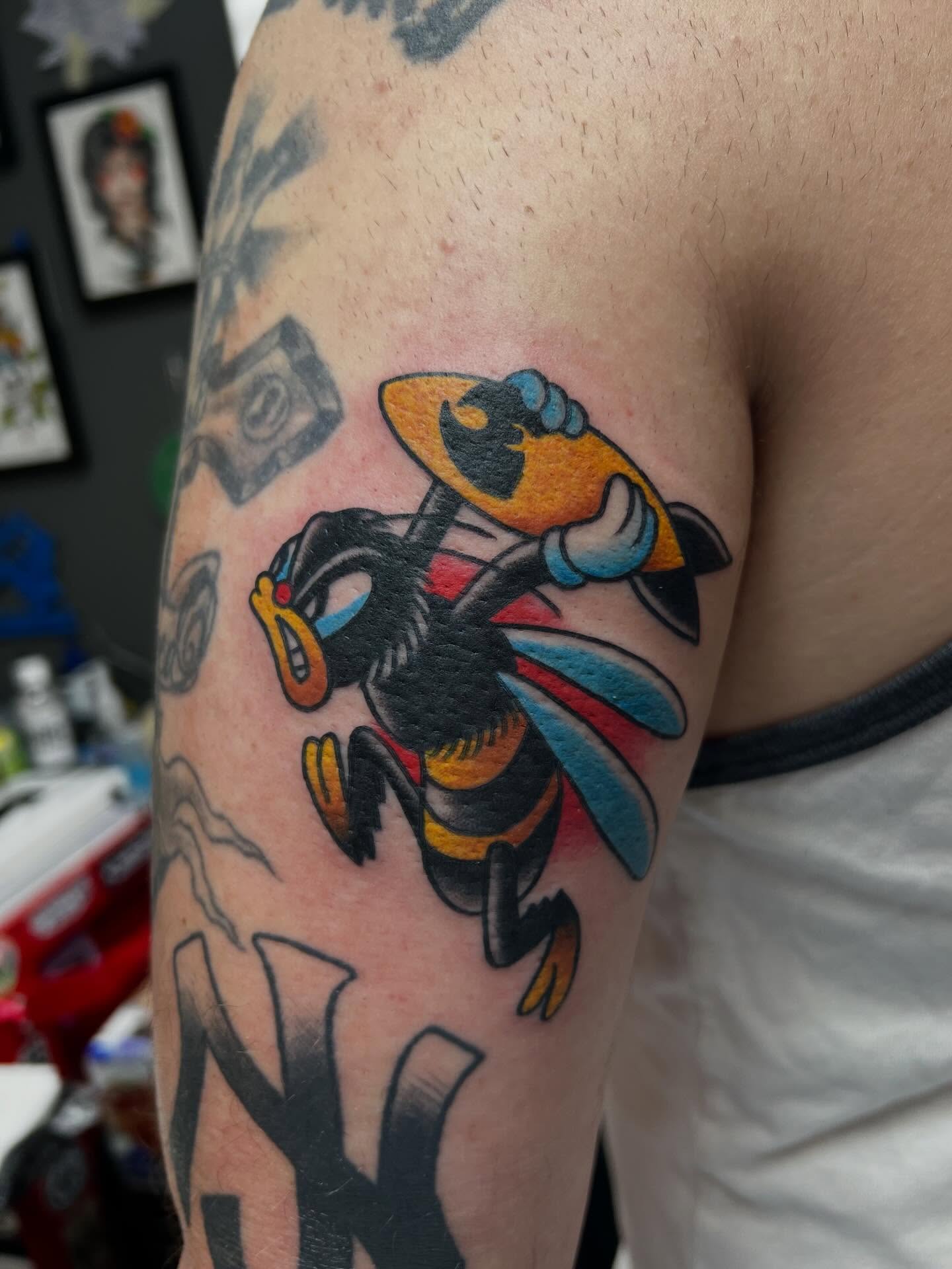 Bee American traditional tattoo on the forearm by Tyler Van Pelt