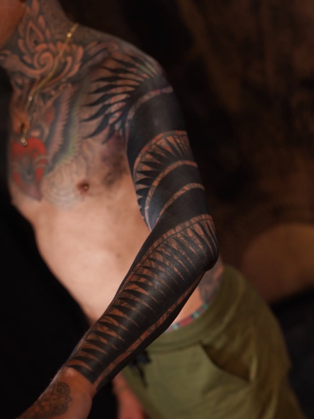 Abstract blackwork sleeve tribal tattoo on the upper arm by Oliver kenton, San Diego, California