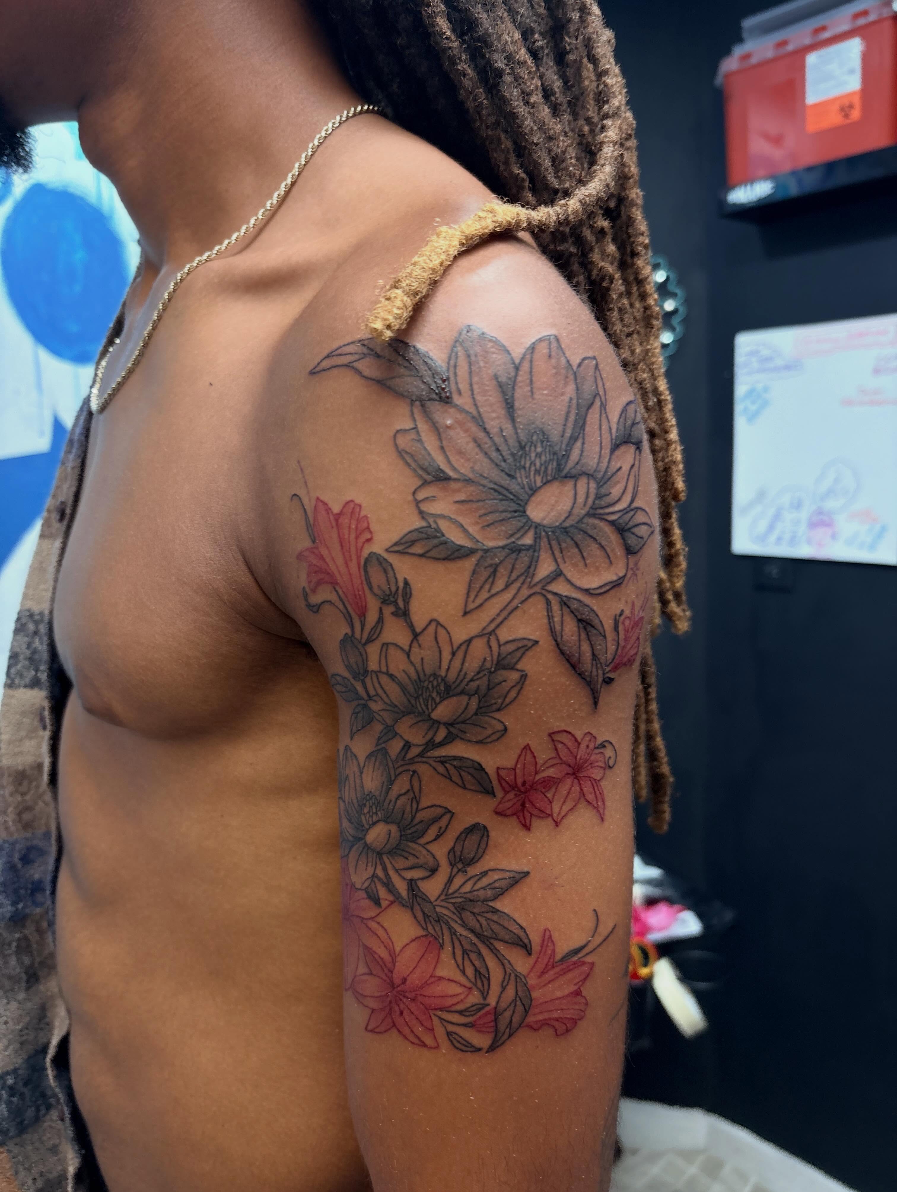 Floral arrangement new school tattoo on the shoulder by 𝓚𝓪𝓻𝓶𝓪💫