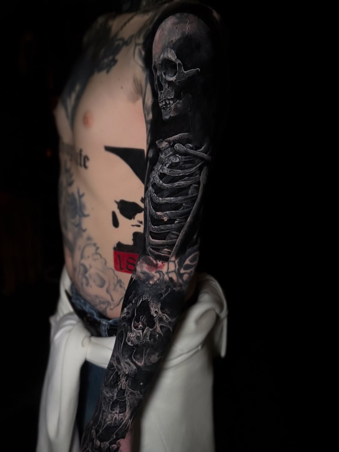 Skeleton and skulls realism tattoo on the forearm by πΈπππ πππ€