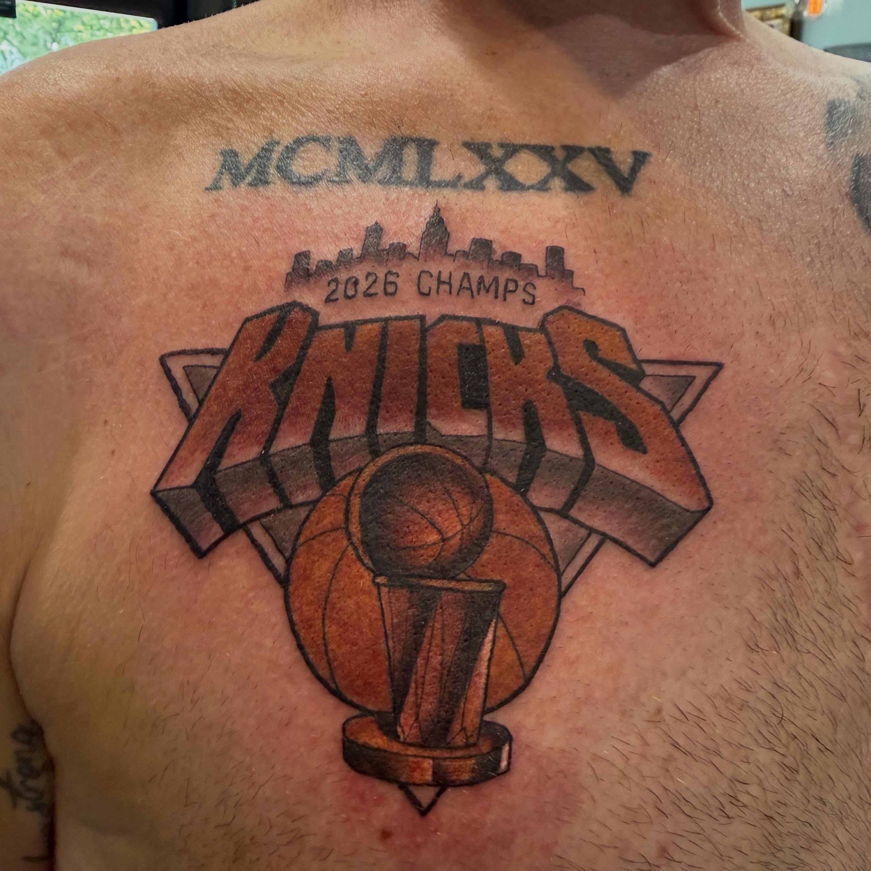 New York Knicks championship American traditional tattoo on the chest by Cory Haberman