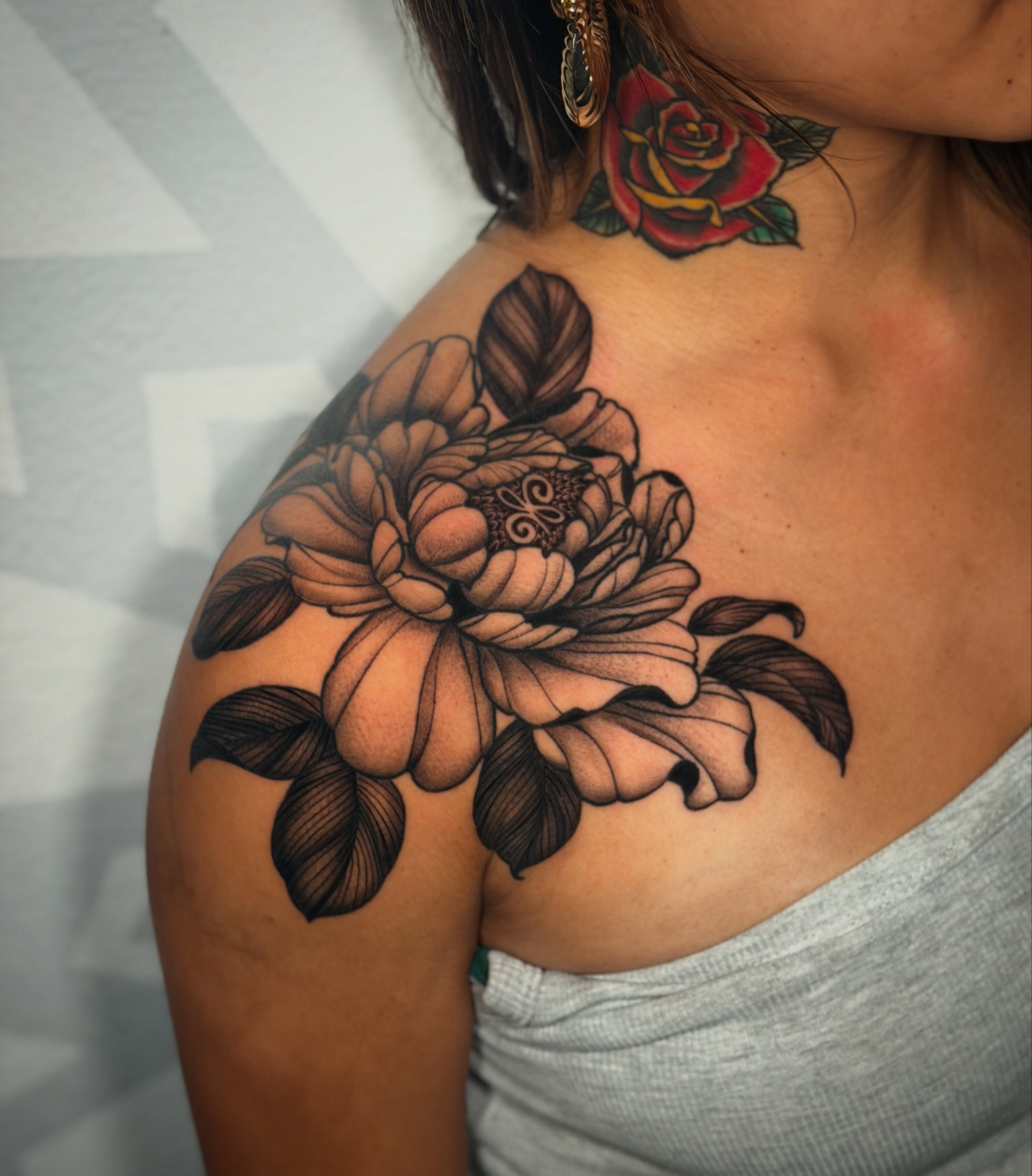 Peony black and grey tattoo on the shoulder by Las Vegas Tattoo Artist