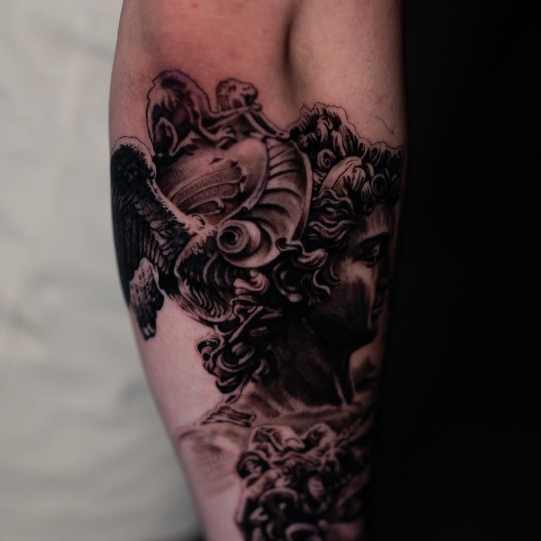 Classical sculpture bust realism tattoo on the forearm by Mark Vata