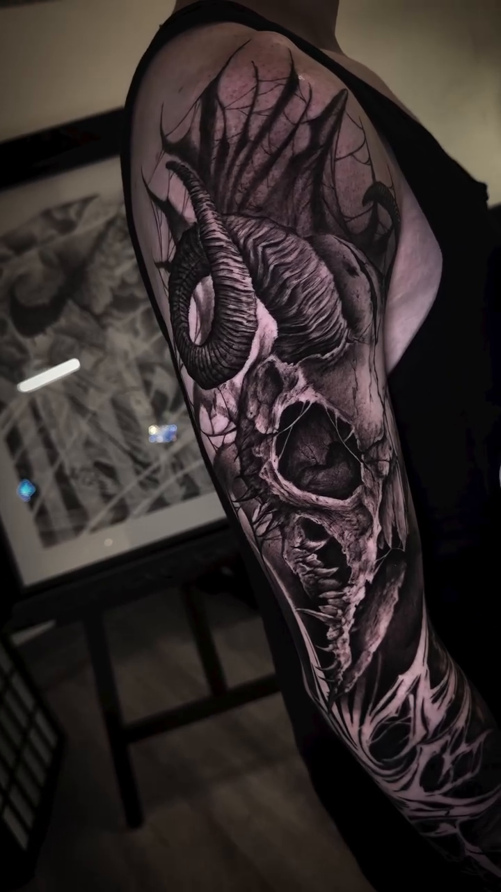 Tattoo by @shanesmith_ink — dark_realism, black_and_grey
