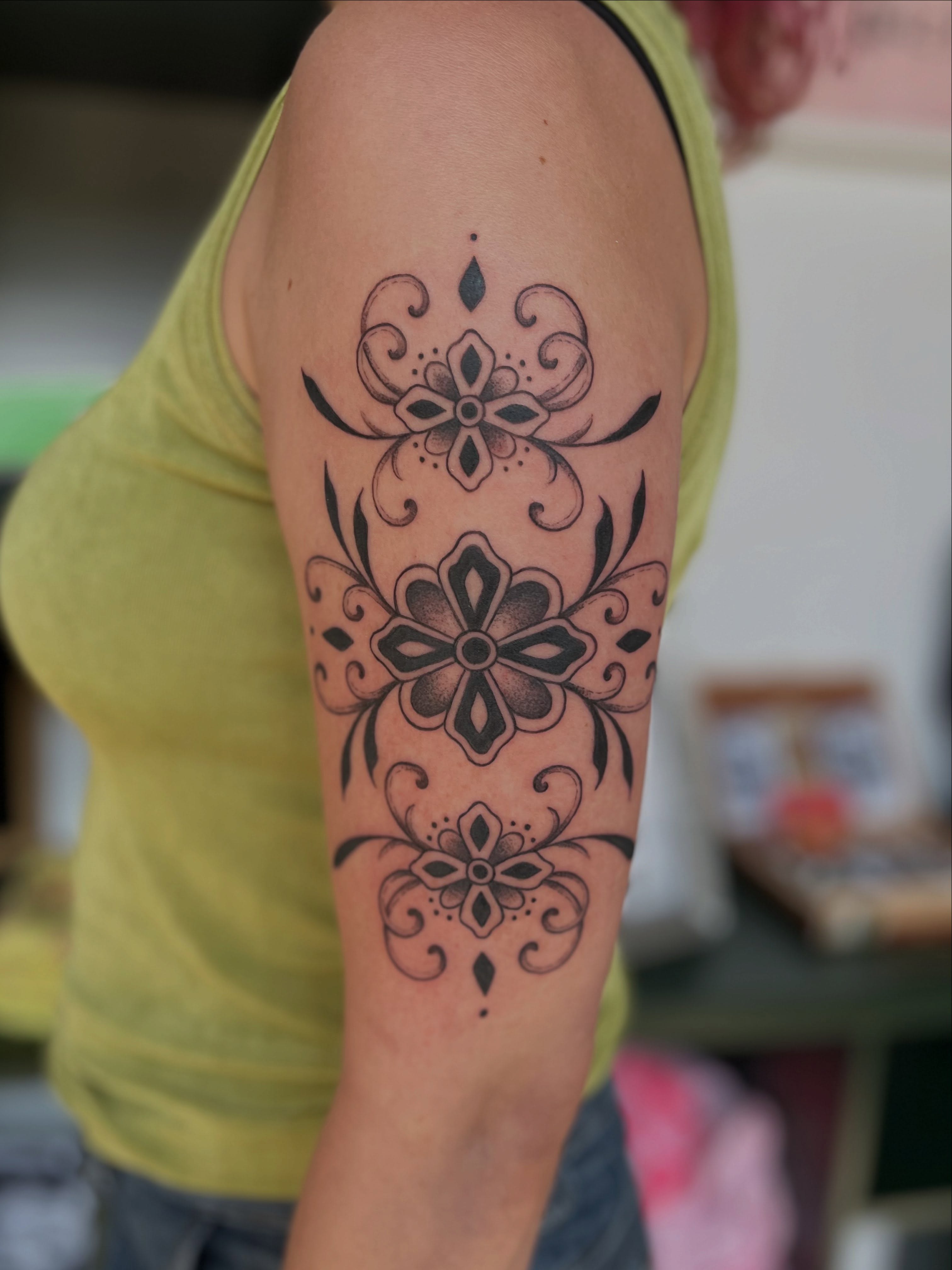 Floral mandala ornamental tattoo on the forearm by Maddy Anthony
