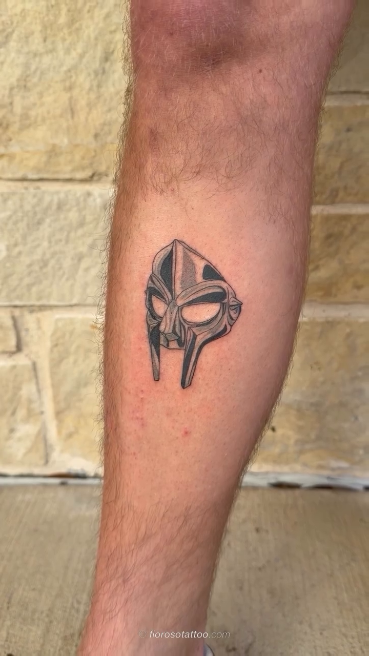 MF DOOM mask tattoo tattoo on the forearm by Jonathan Paul Fiore, Austin, Texas