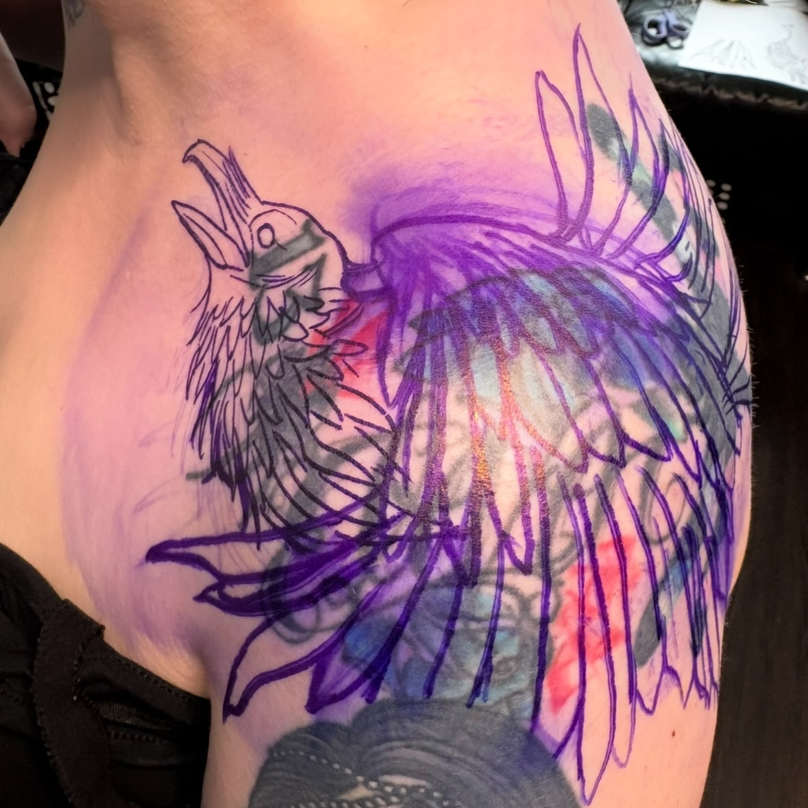 Crow watercolor tattoo on the shoulder by ๐๐๐ฏ๐ฌ๐ซ ๐๐ก๐ก๐๐ช๐ฐ