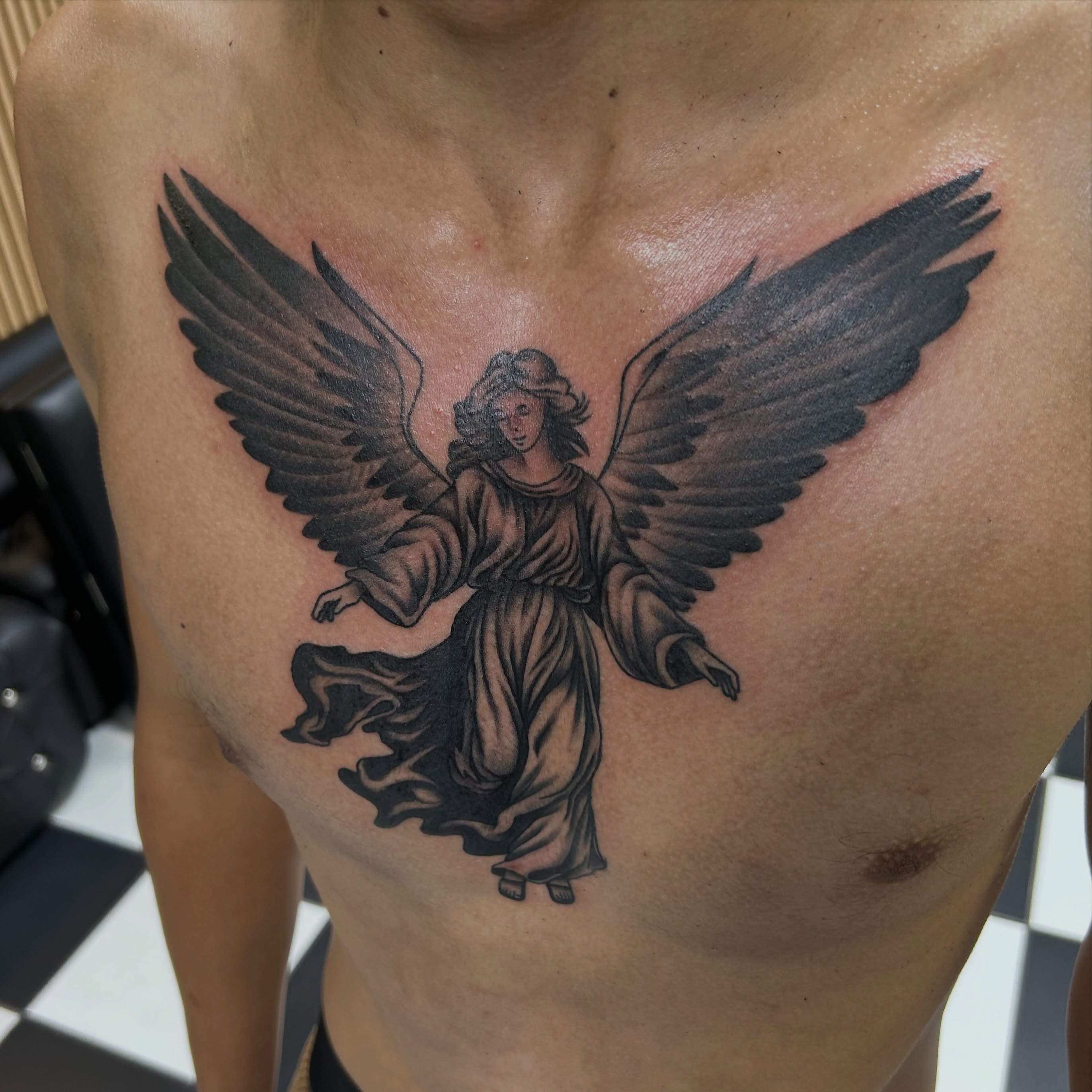 Angel black and grey tattoo on the chest by Tattoos by Corey aka MrLu