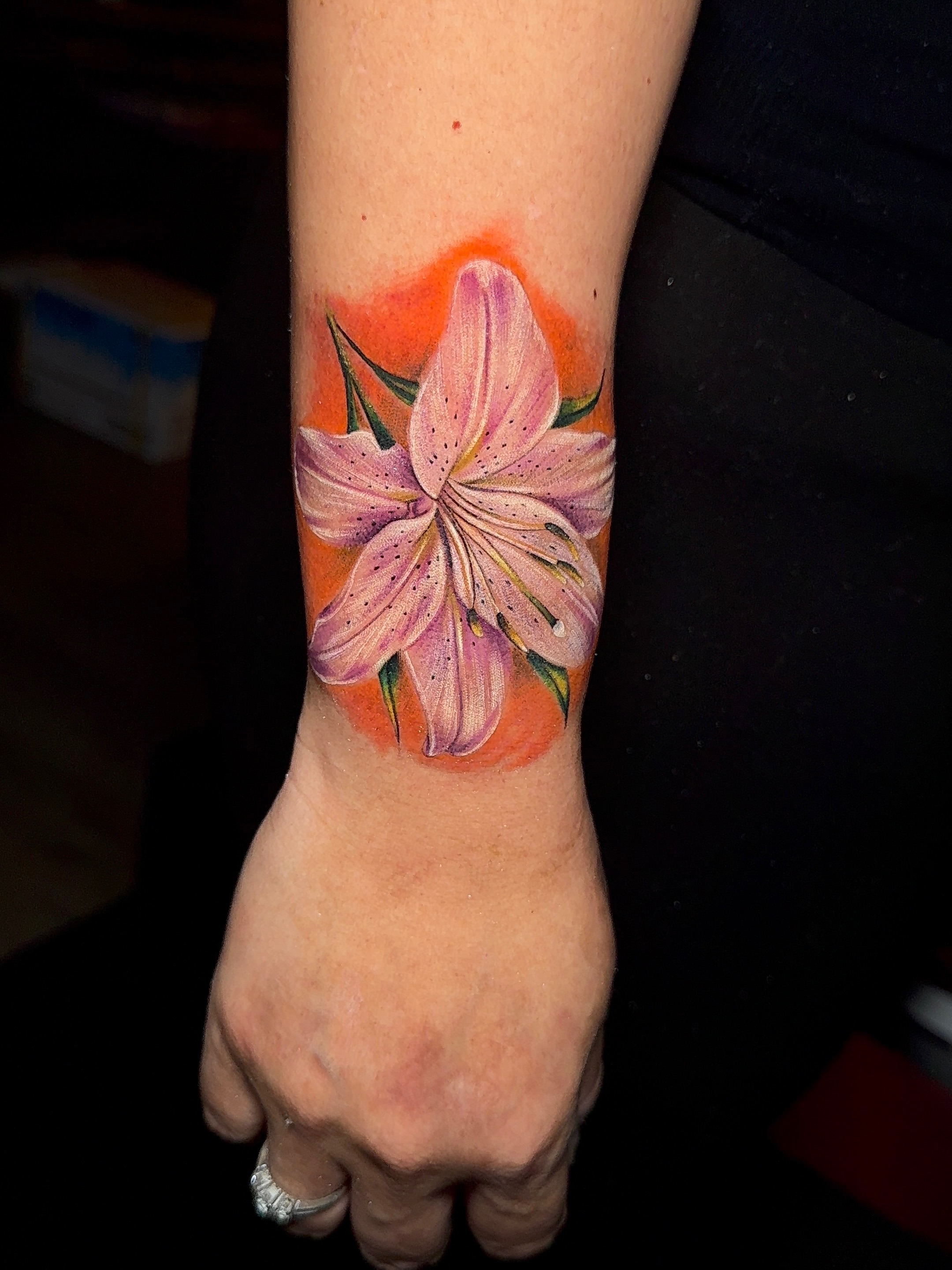 Lily realism tattoo on the forearm by Dallas tattoo artist, Dallas, Texas