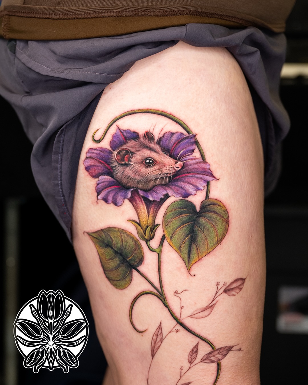 Mouse and flower realism tattoo on the thigh by Ori Merchan Tattoo, Kansas City, Missouri