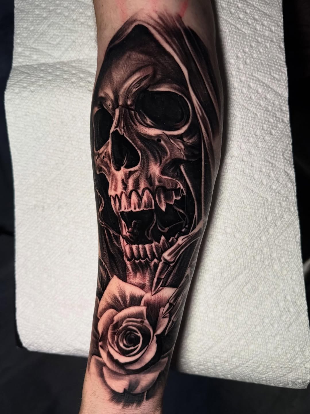 Tattoo by @tattoo_isaac562 — black_and_grey, realism