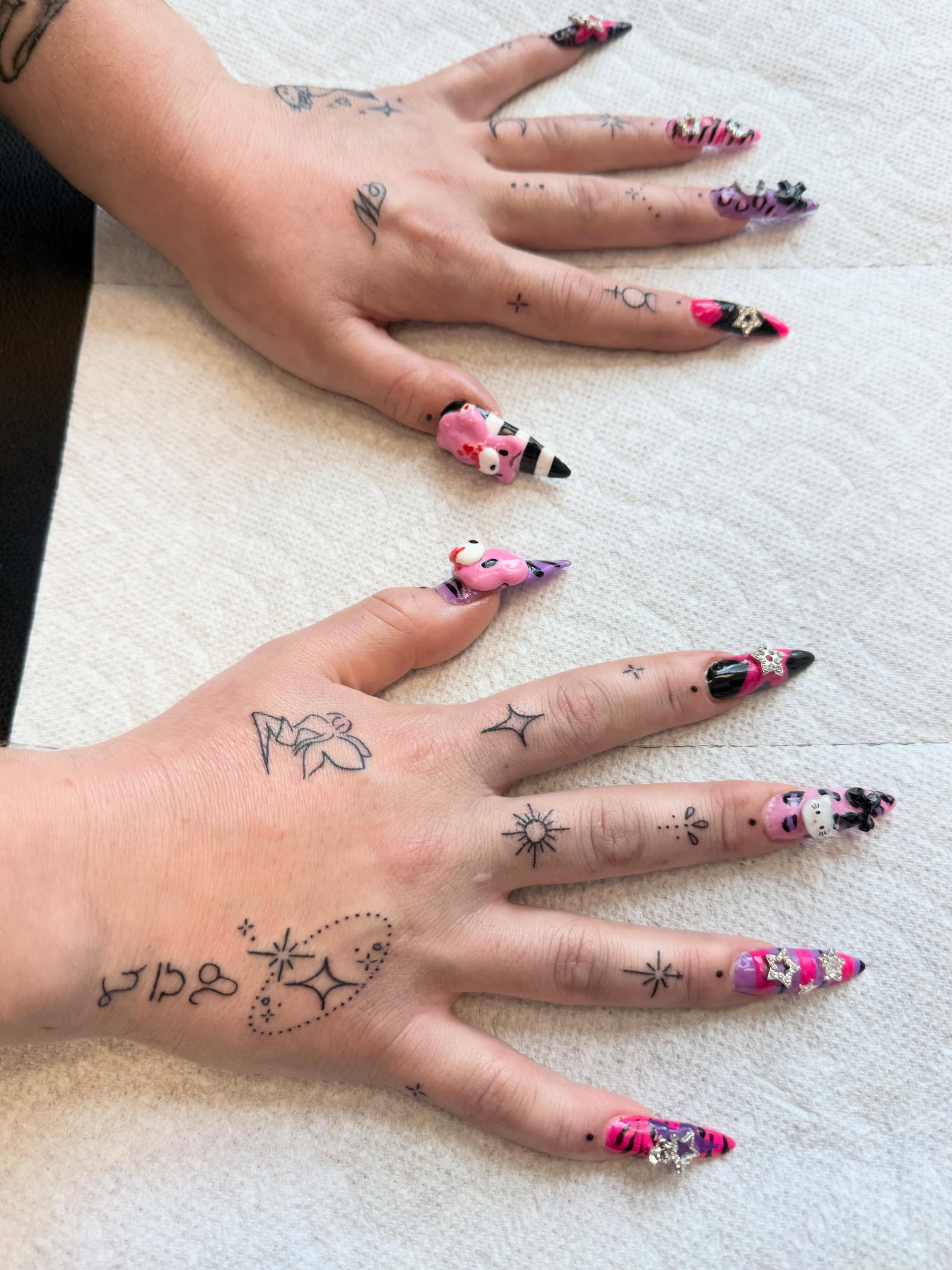 Hello kitty new school tattoo on the hand by ✨olivia