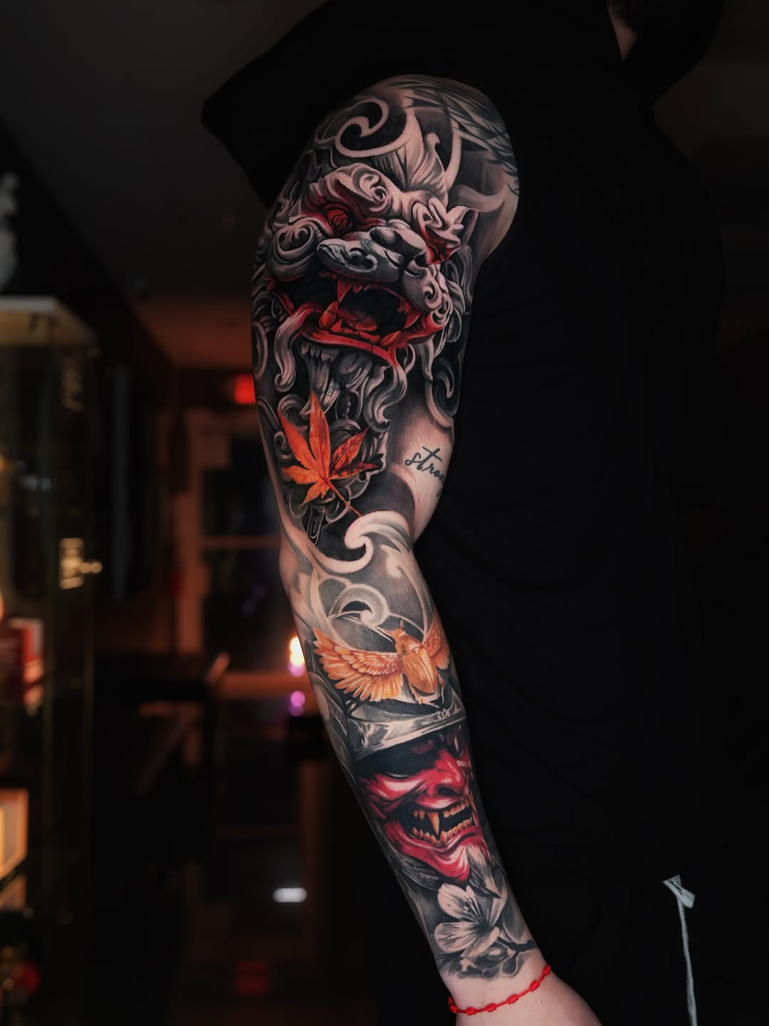 Samurai mask and dragon Japanese tattoo on the forearm by Andres García Baeza