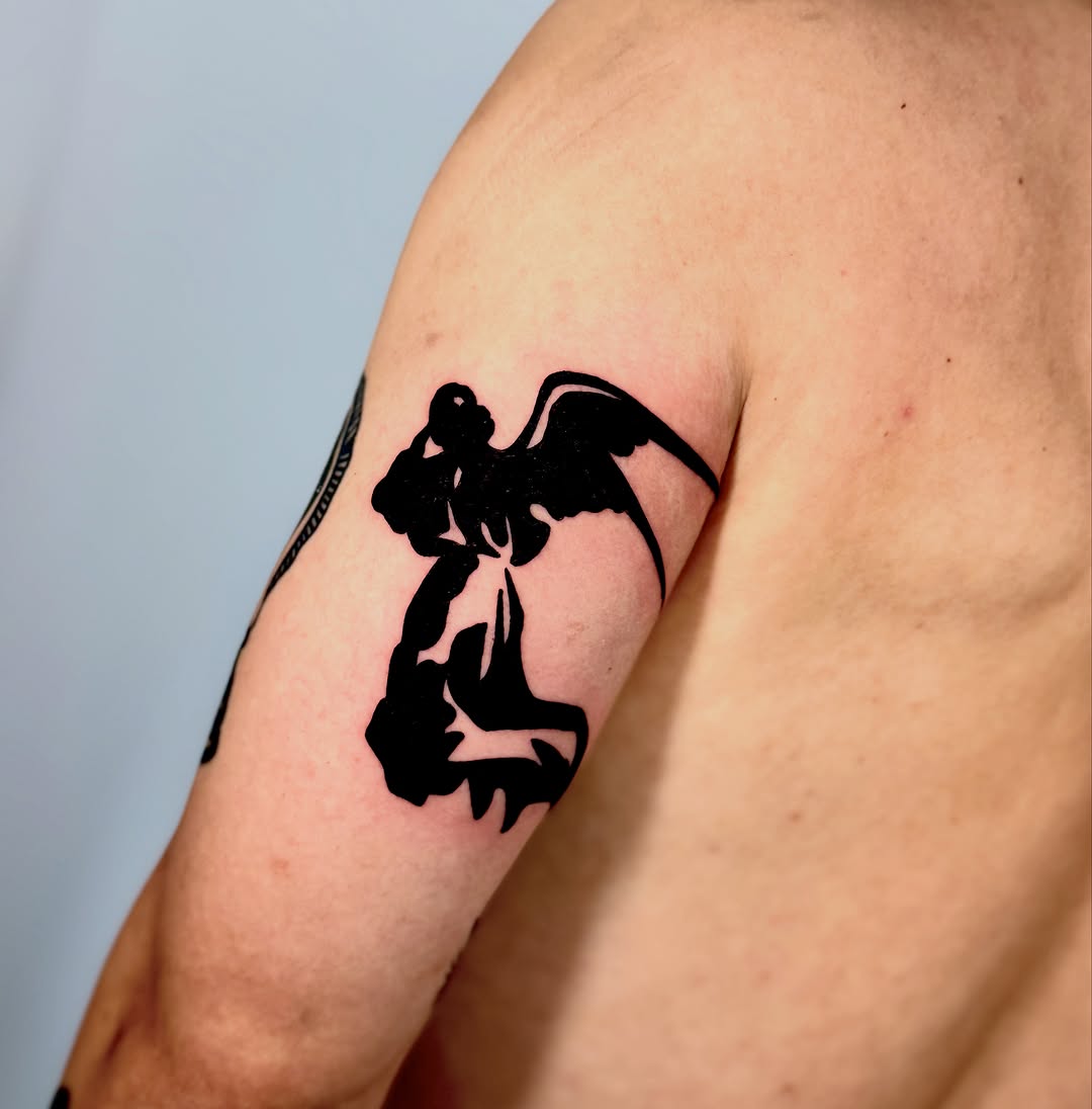Angel realism tattoo on the shoulder by Orca