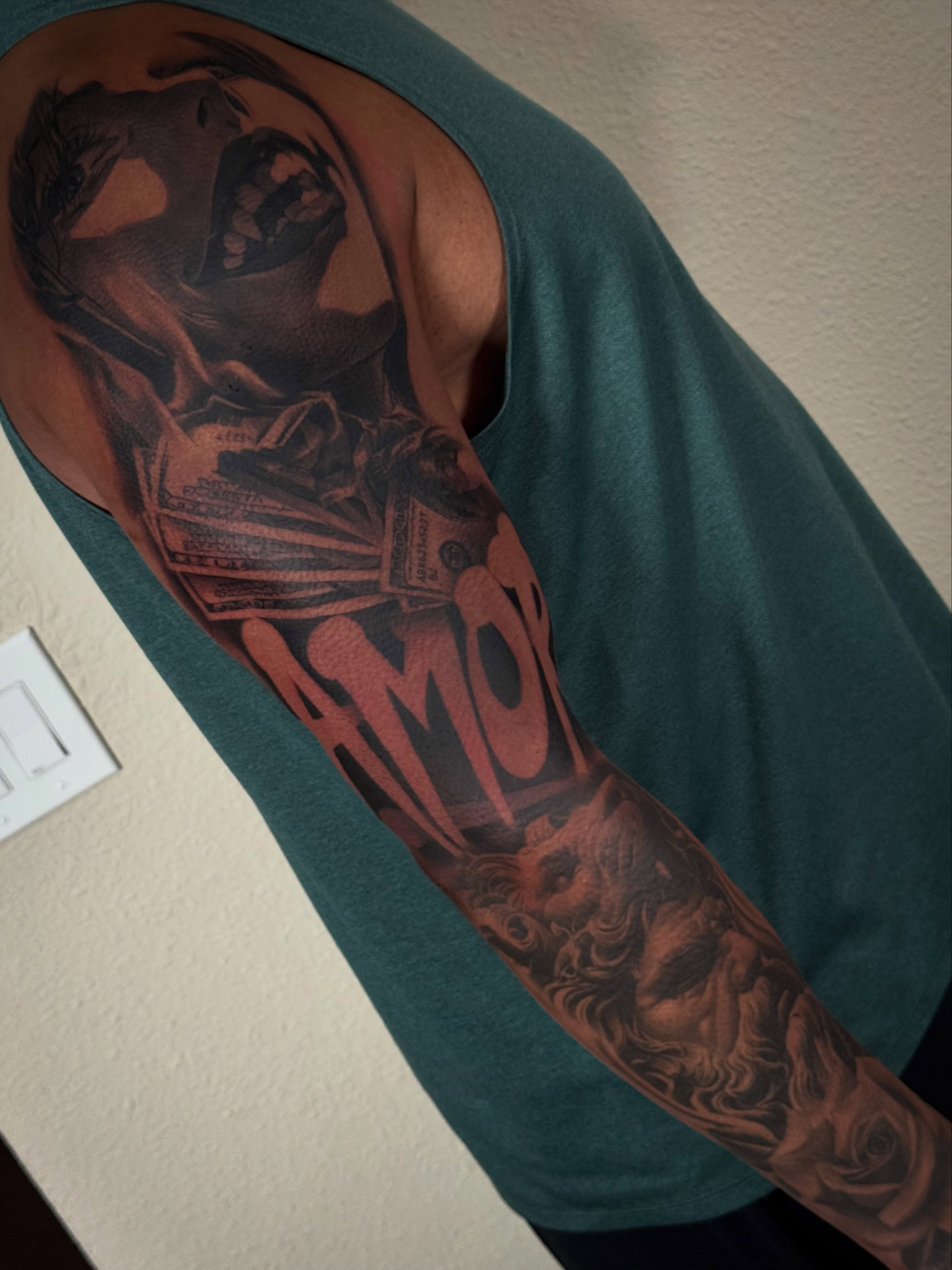 Amor realism tattoo on the upper arm by 🇵🇭Joseph Passion