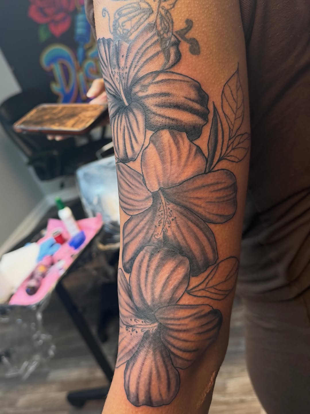 Hibiscus flowers fine line tattoo on the forearm by XoXandrea.Ink, Kansas City, Missouri