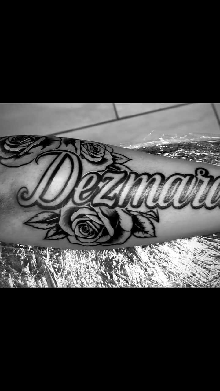 Tattoo by @noirtatu — lettering_script, black_and_grey